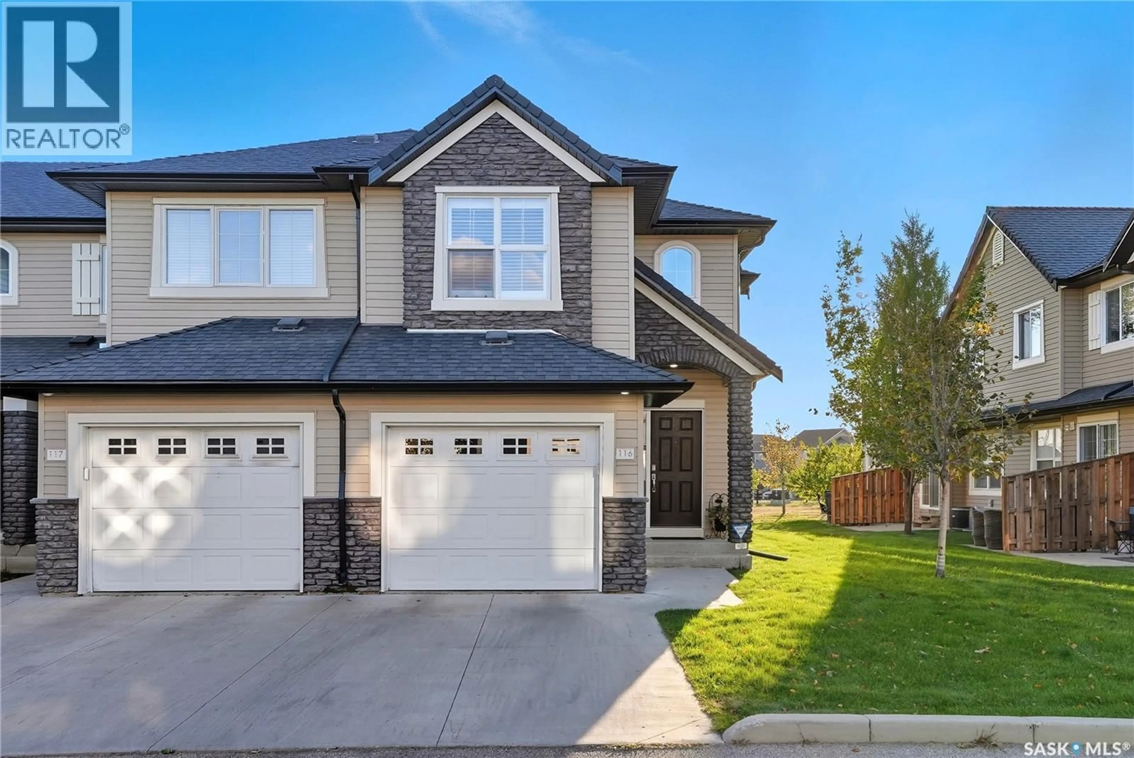 Home with brick exterior material, street for 410 - 116 LEDINGHAM WAY, Saskatoon Saskatchewan S7V0C4