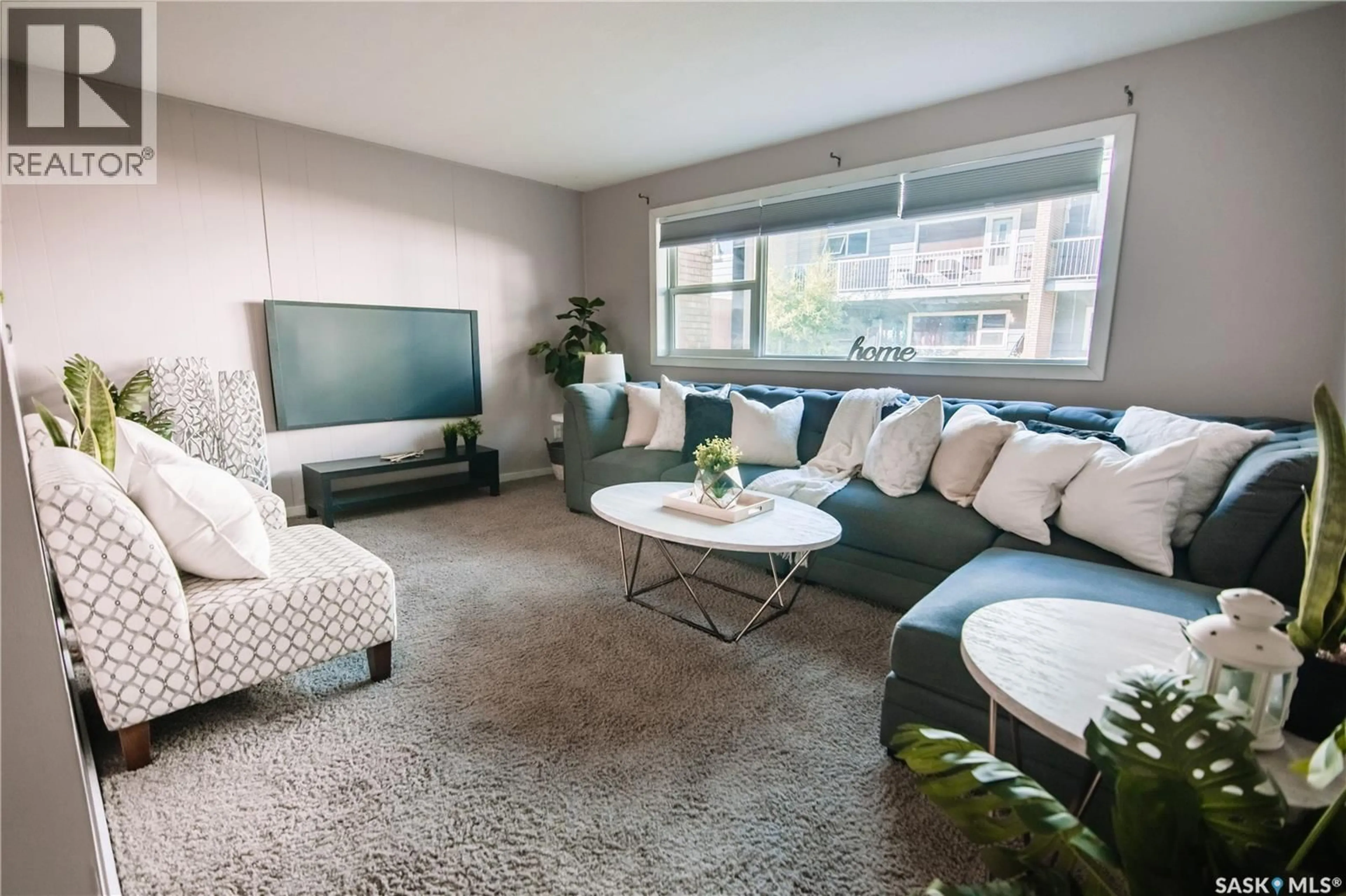 Living room with furniture, carpet floor for 28 42 SPENCE STREET, Regina Saskatchewan S4S4H4