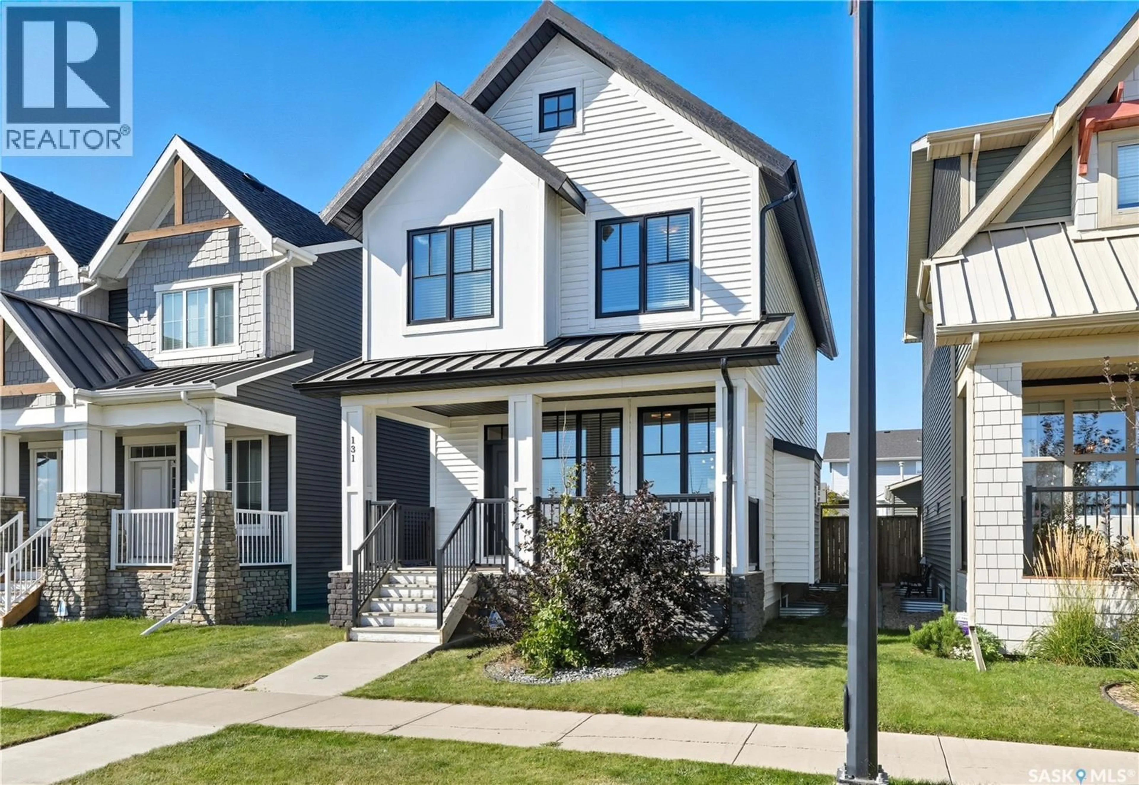 Home with vinyl exterior material, street for 131 SKOPIK ROAD, Saskatoon Saskatchewan S7V0V7