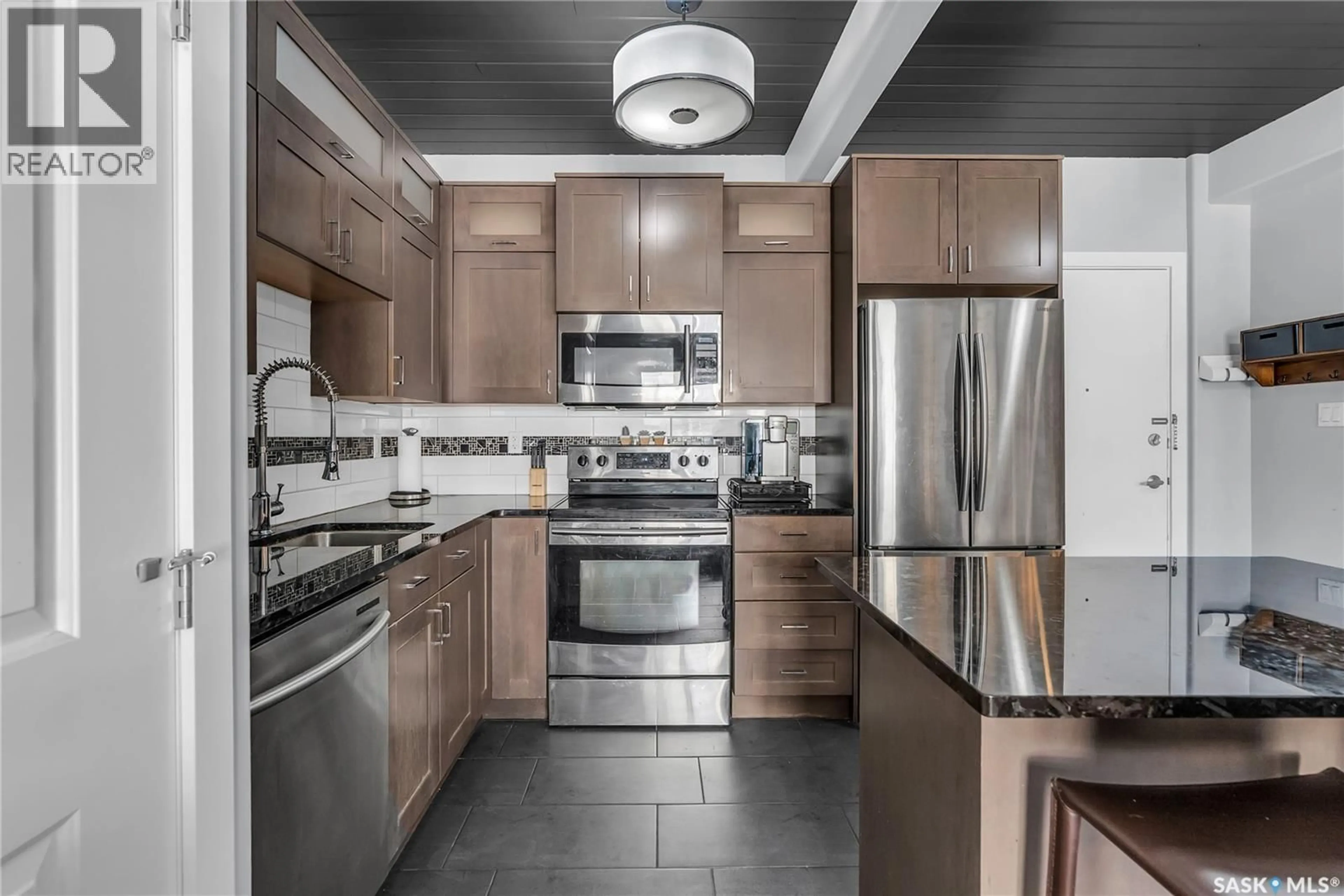 Contemporary kitchen, ceramic/tile floor for N - 304 415 3RD AVENUE, Saskatoon Saskatchewan S7K2J2