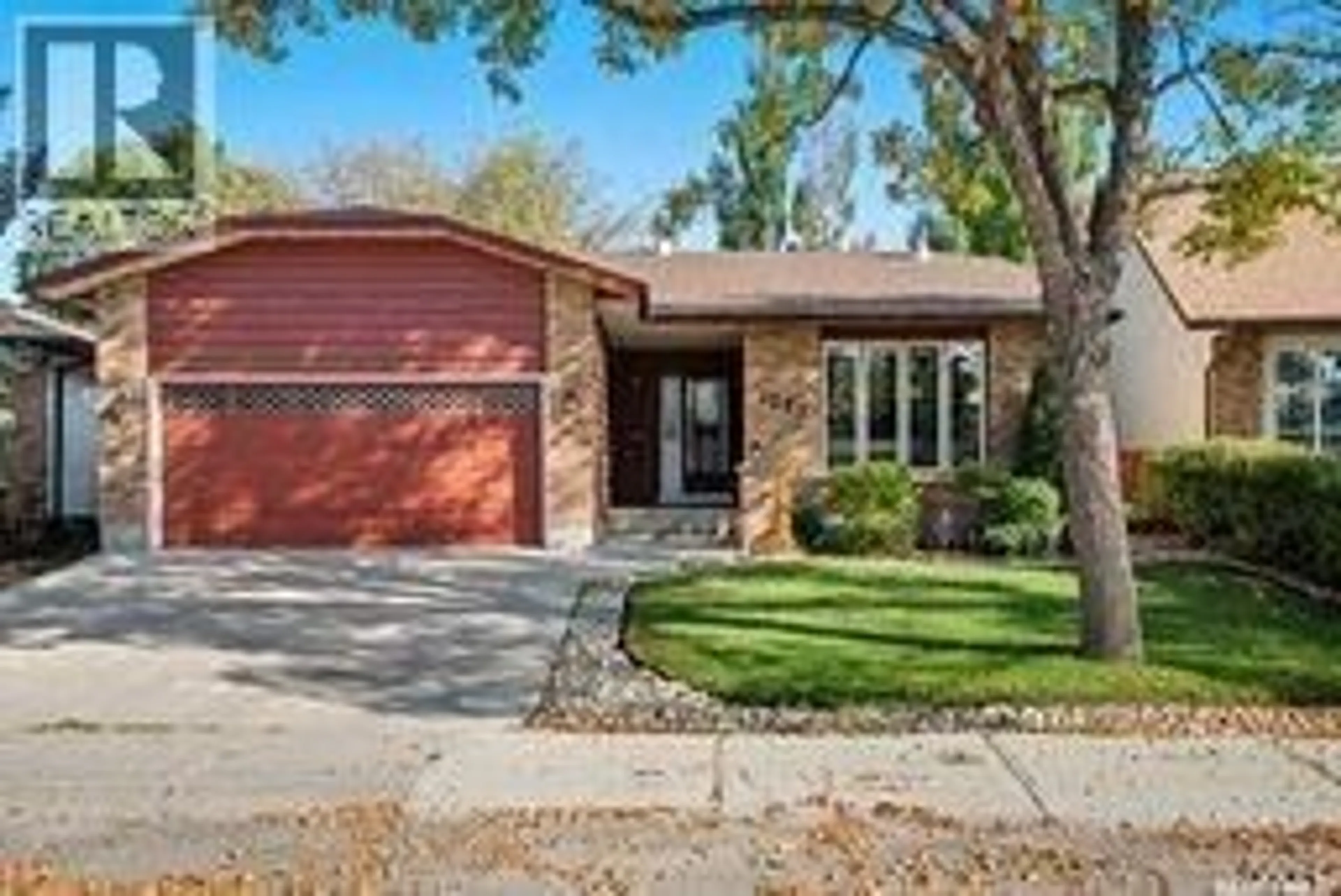 Home with brick exterior material, street for 1227 RADWAY STREET, Regina Saskatchewan S4X2Z9