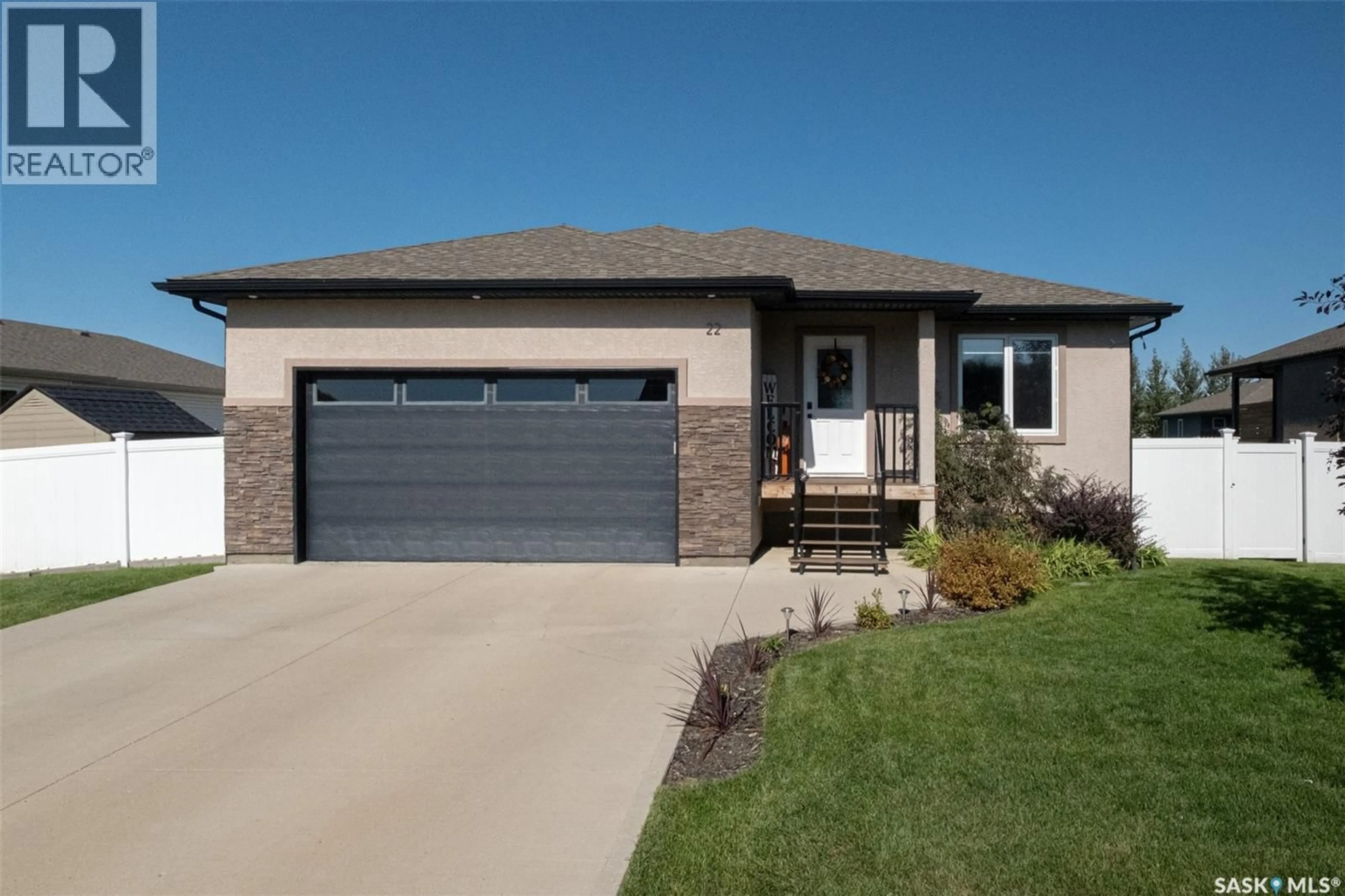 Home with brick exterior material, street for Bay - 22 STARDUST BAY, White City Saskatchewan S4L0A1