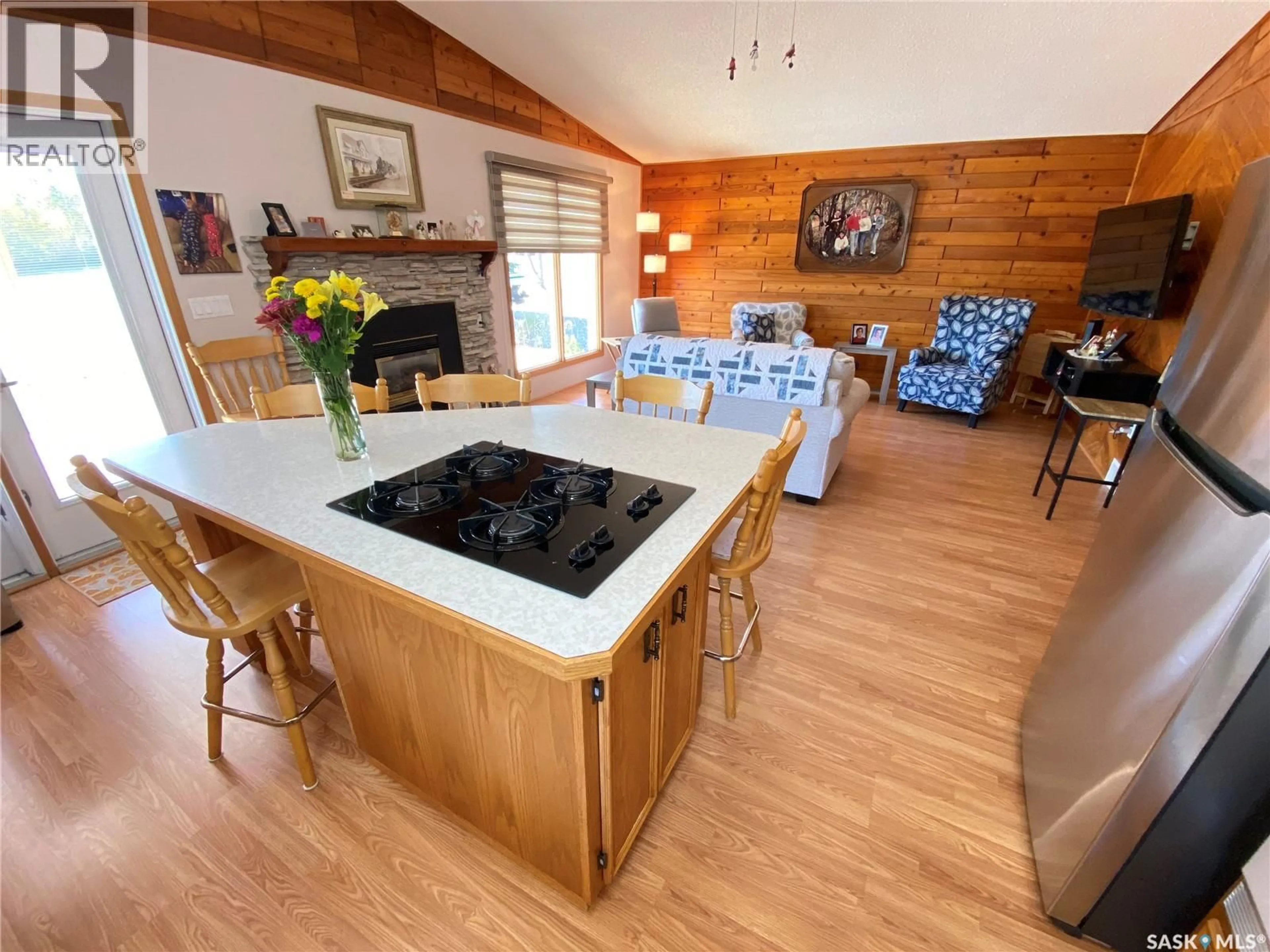Open concept kitchen, wood/laminate floor for 139 PEBBLE BEACH ROAD, Good Lake Rm No. 274 Saskatchewan S0A0L0