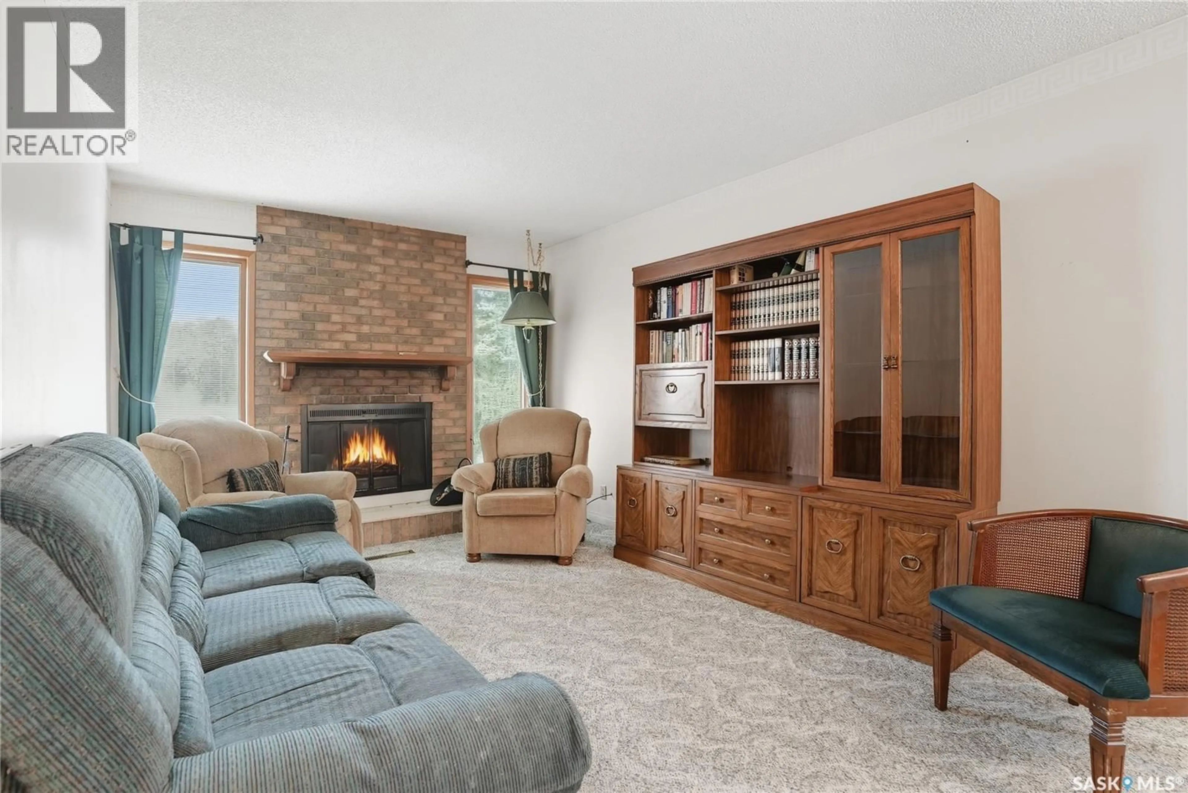 Living room with furniture, unknown for 11 MOXON CRESCENT, Saskatoon Saskatchewan S7H3B8