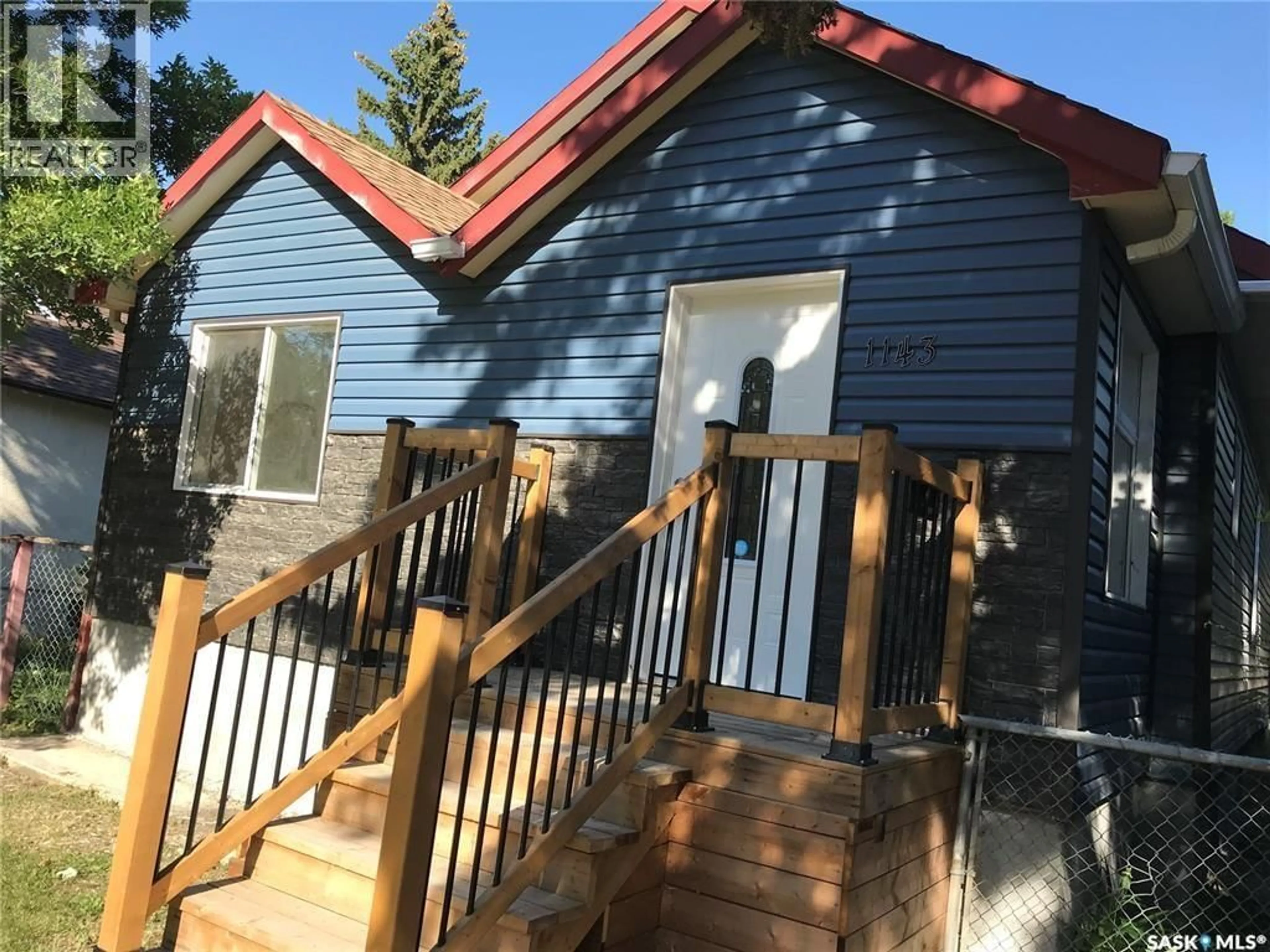 Home with vinyl exterior material, street for 1143 MONTAGUE STREET, Regina Saskatchewan S4T3H8