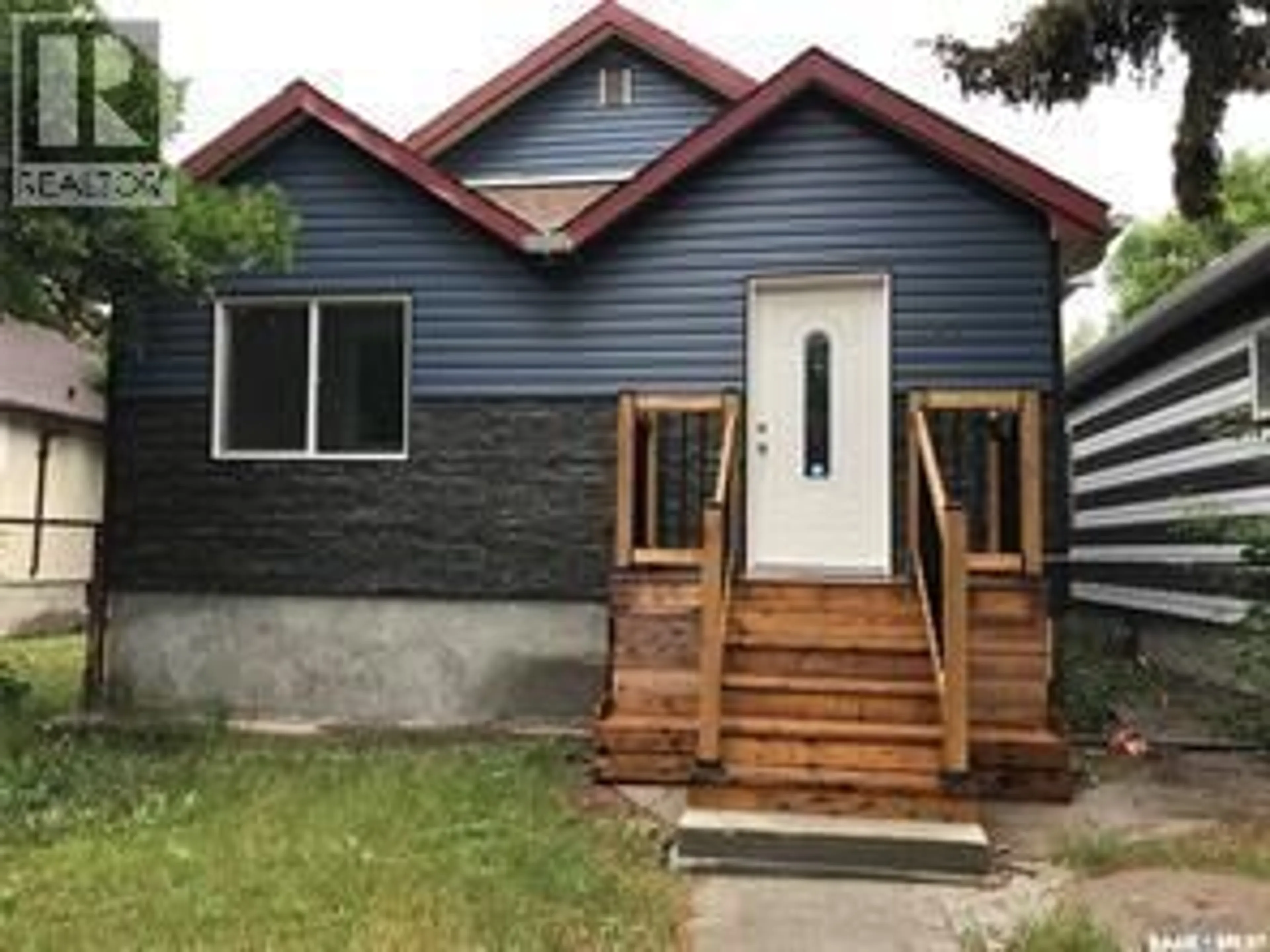 Home with vinyl exterior material, street for 1143 MONTAGUE STREET, Regina Saskatchewan S4T3H8