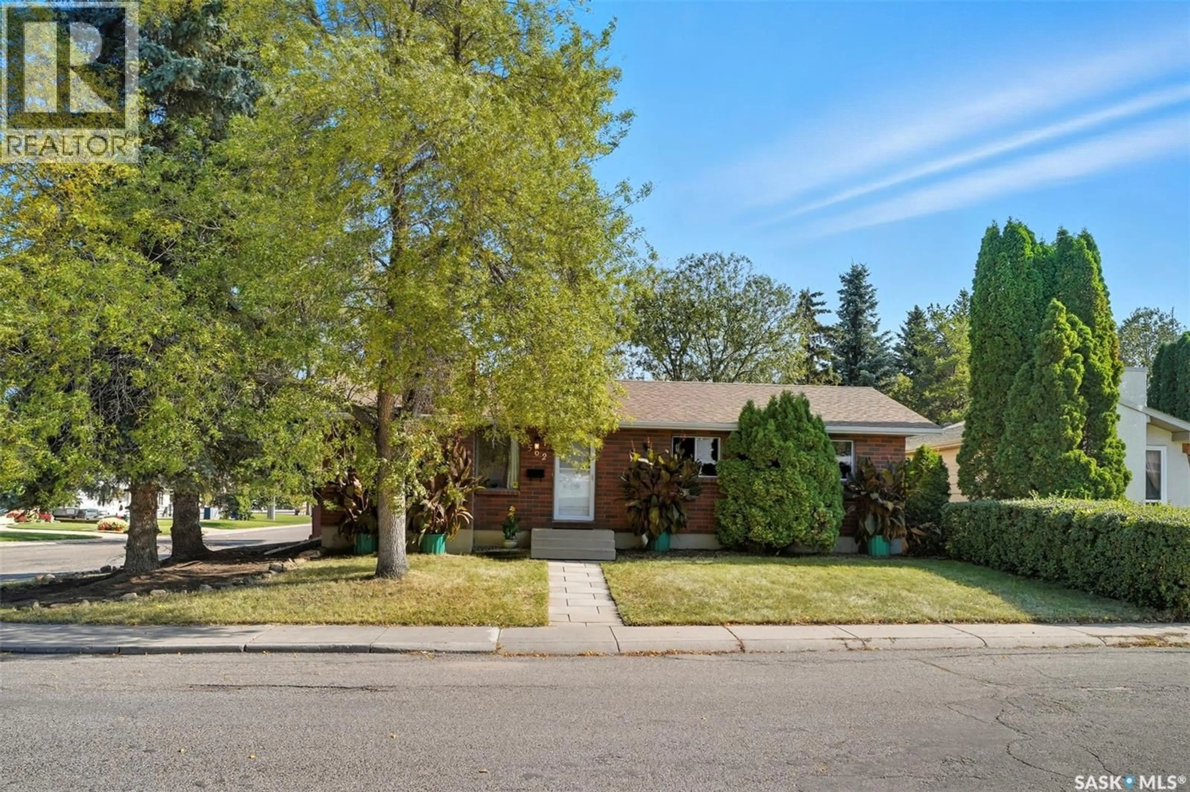 Home with brick exterior material, street for 562 HIGHLANDS TERRACE, Saskatoon Saskatchewan S7H4Y6