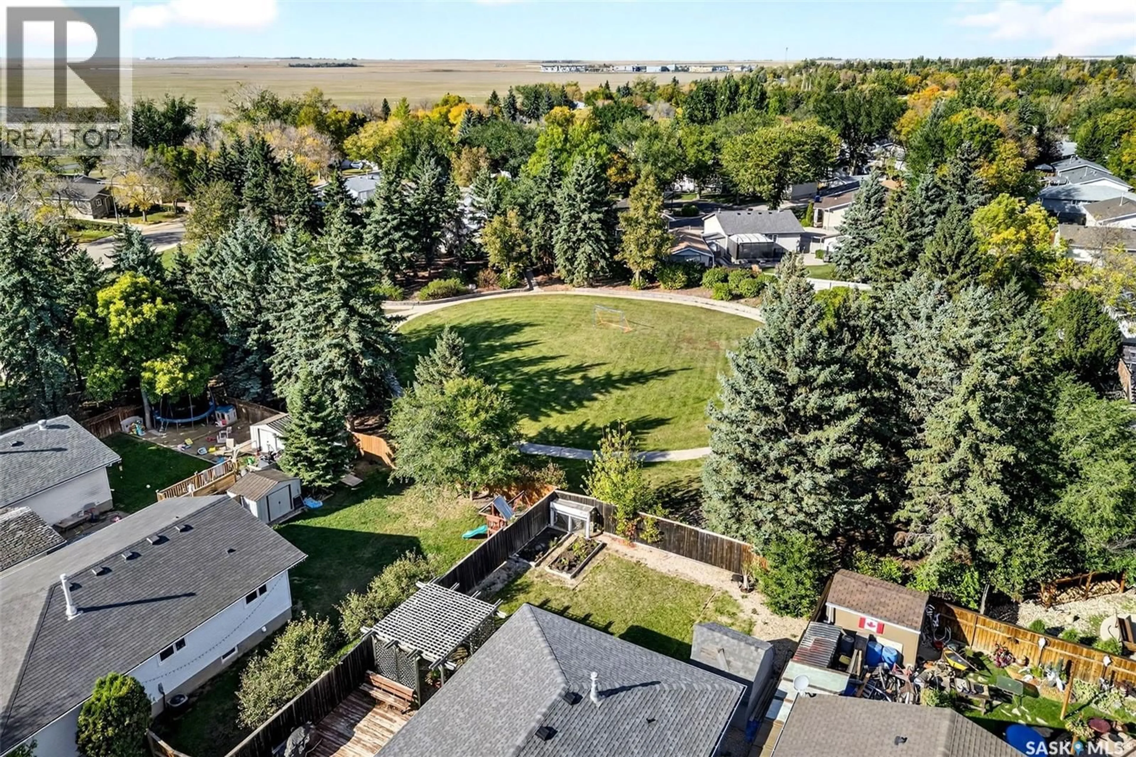 A pic from outside/outdoor area/front of a property/back of a property/a pic from drone, mountain view for 210 CHURCH DRIVE, Regina Saskatchewan S4X1M1