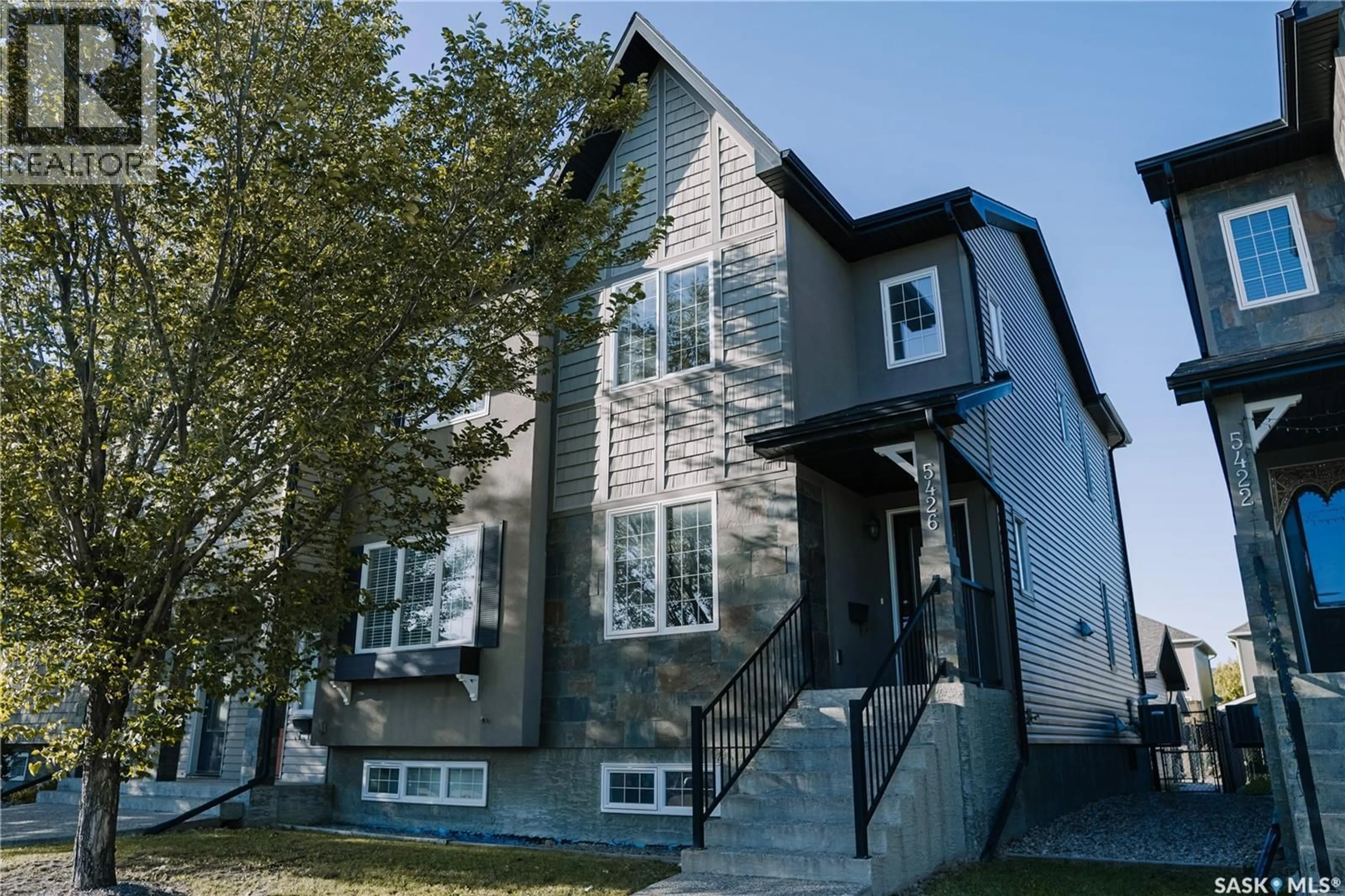 Home with vinyl exterior material, street for 5426 MITCHINSON WAY, Regina Saskatchewan S4W0E7