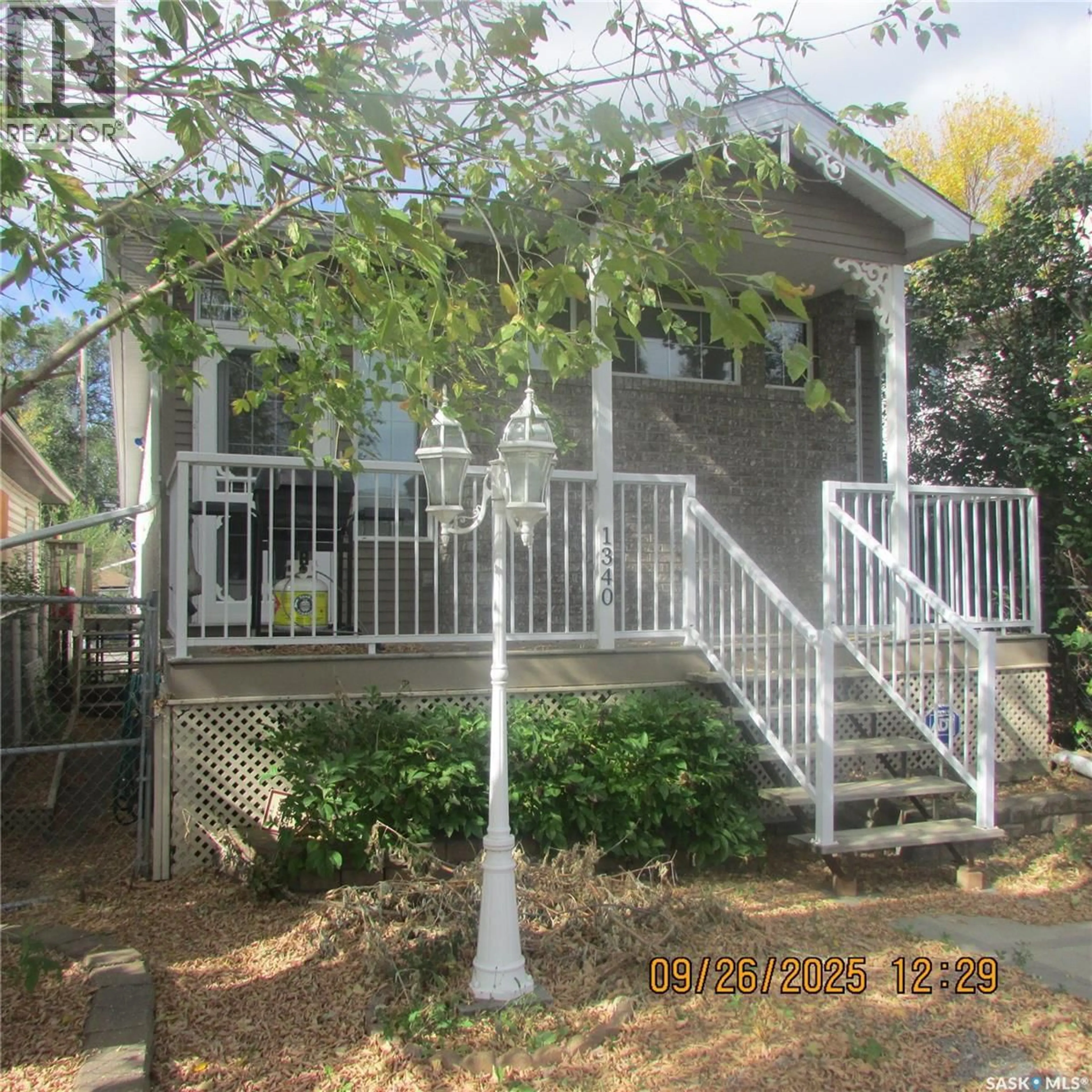 Home with vinyl exterior material, street for 1340 MCINTOSH STREET, Regina Saskatchewan S4T5C2