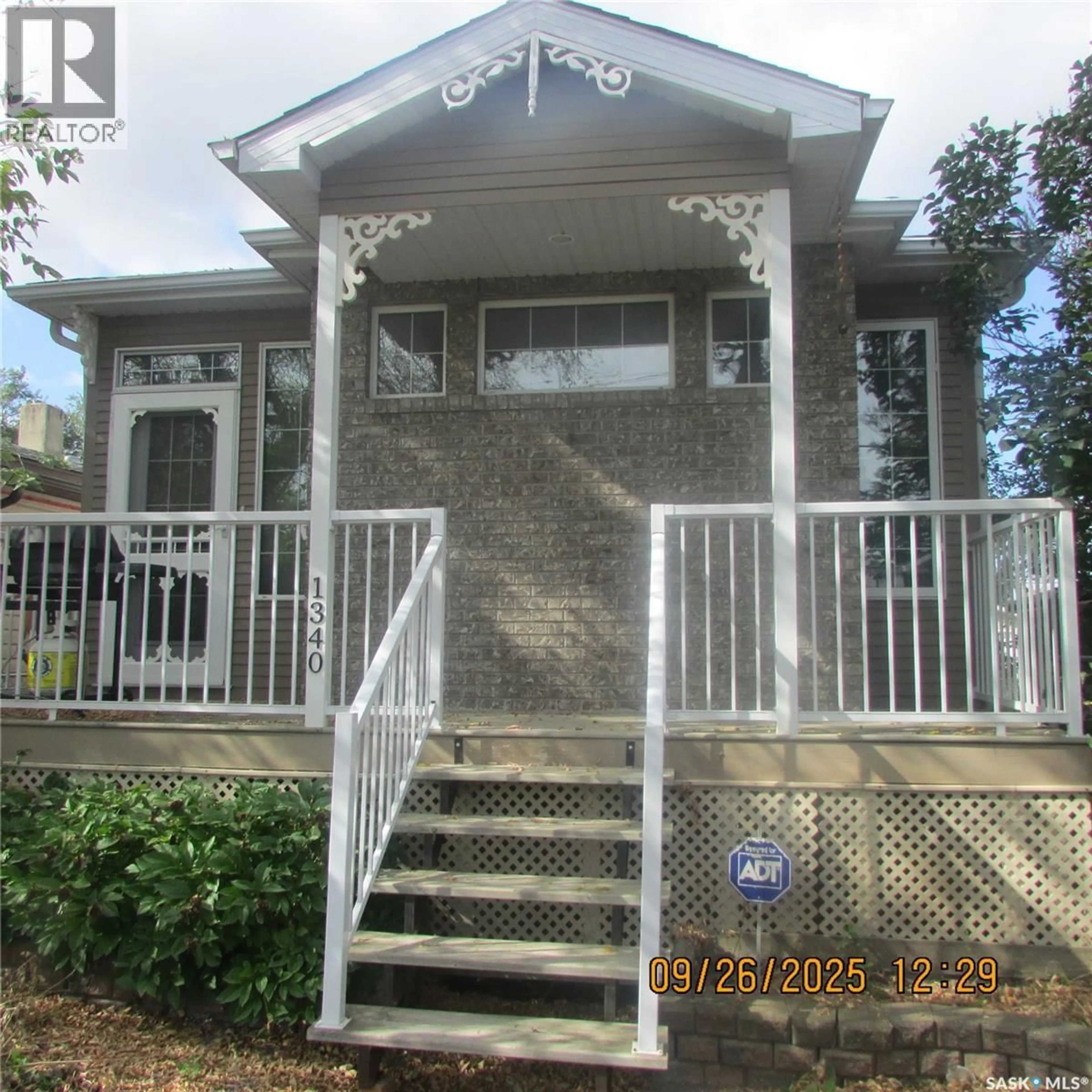 Home with vinyl exterior material, street for 1340 MCINTOSH STREET, Regina Saskatchewan S4T5C2