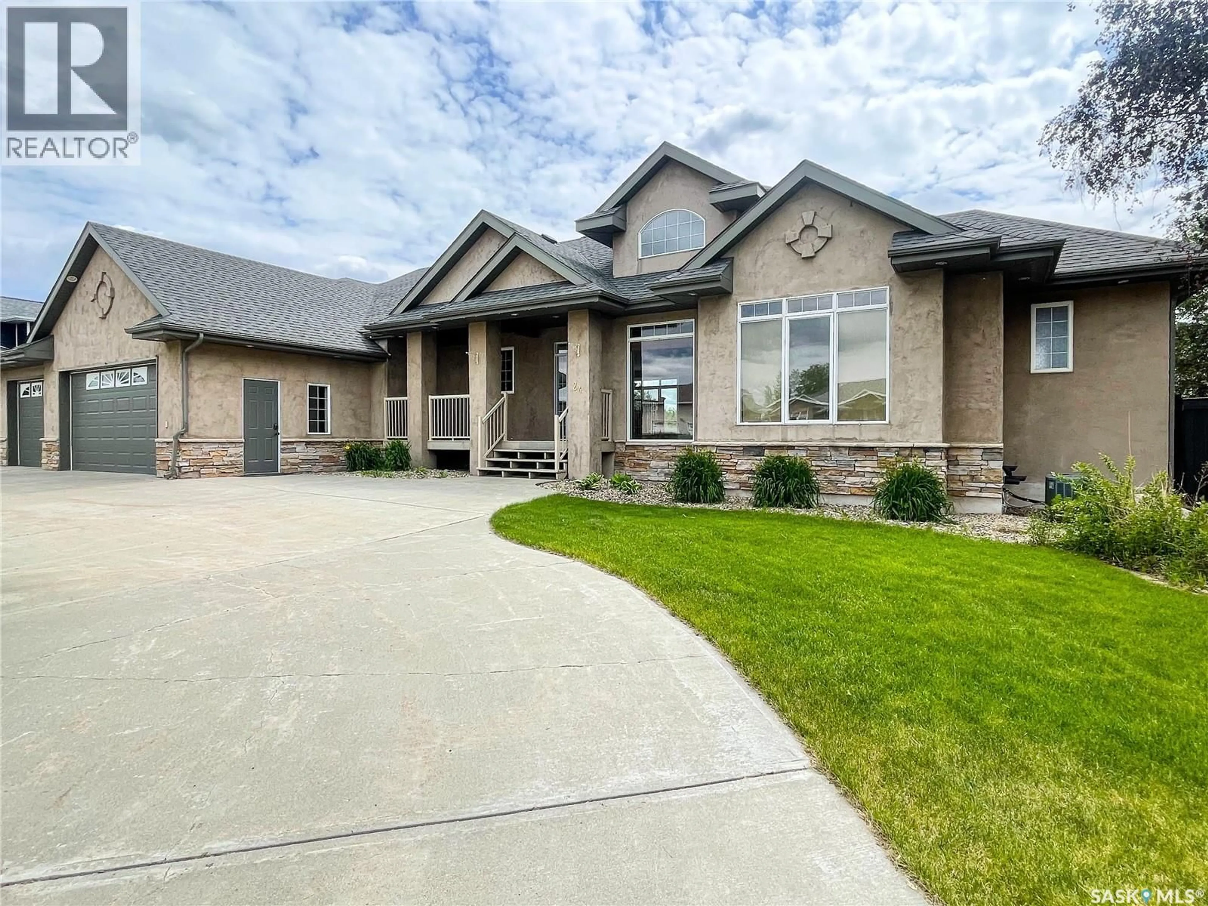 Home with brick exterior material, street for 24 BRIDGER DRIVE, Meadow Lake Saskatchewan S9X2A1