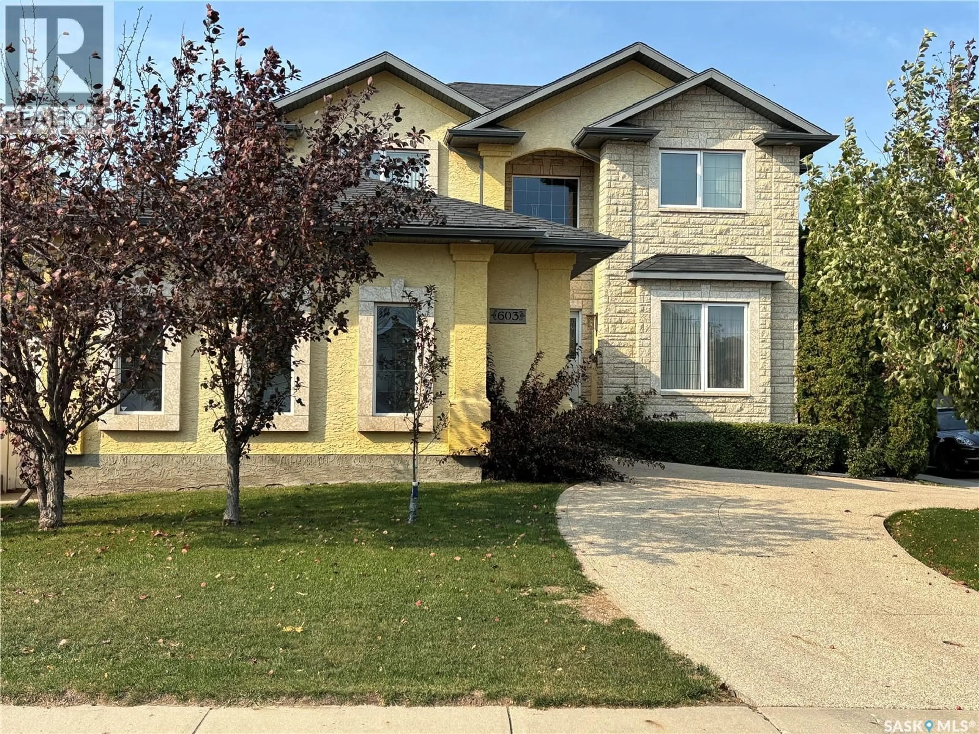 Home with brick exterior material, street for 603 BROOKHURST COURT, Saskatoon Saskatchewan S7V1E5