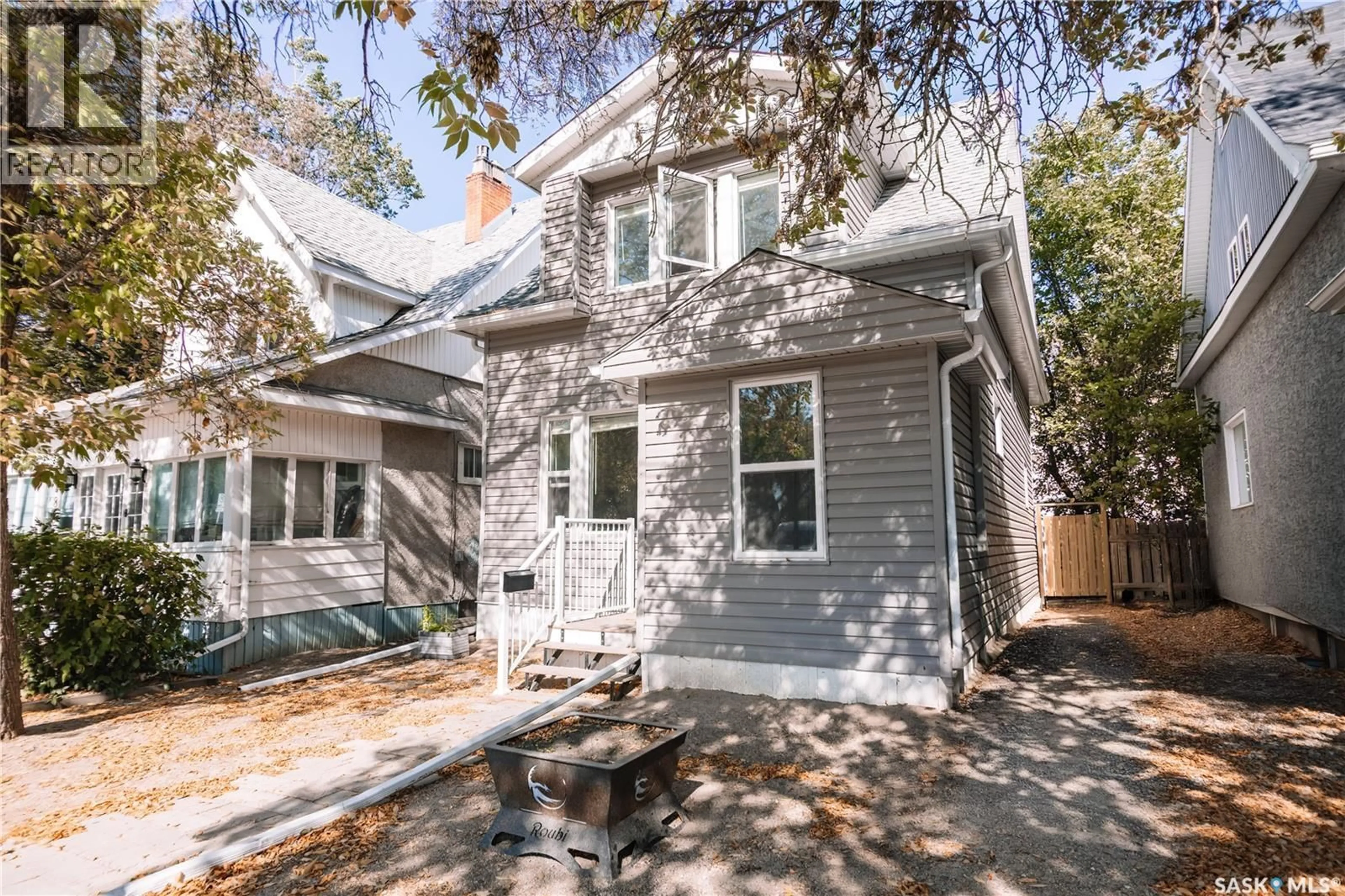 Home with vinyl exterior material, street for 2832 12TH AVE, Regina Saskatchewan S4T1J4
