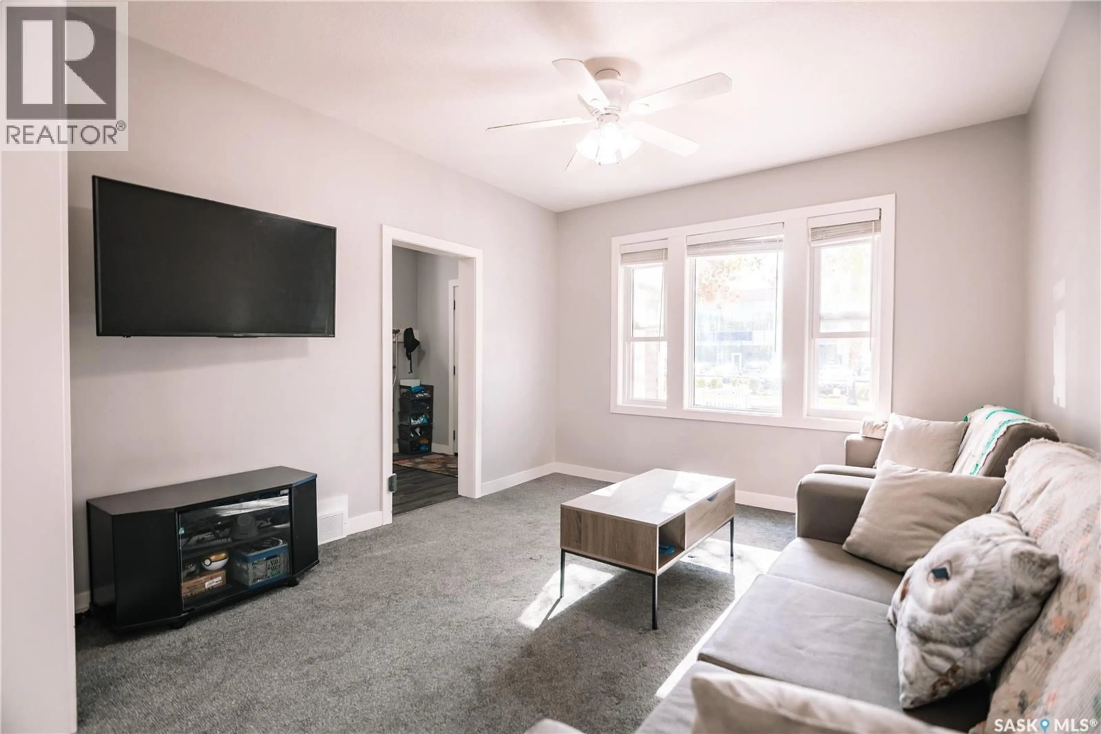 Living room with furniture, unknown for 2832 12TH AVE, Regina Saskatchewan S4T1J4