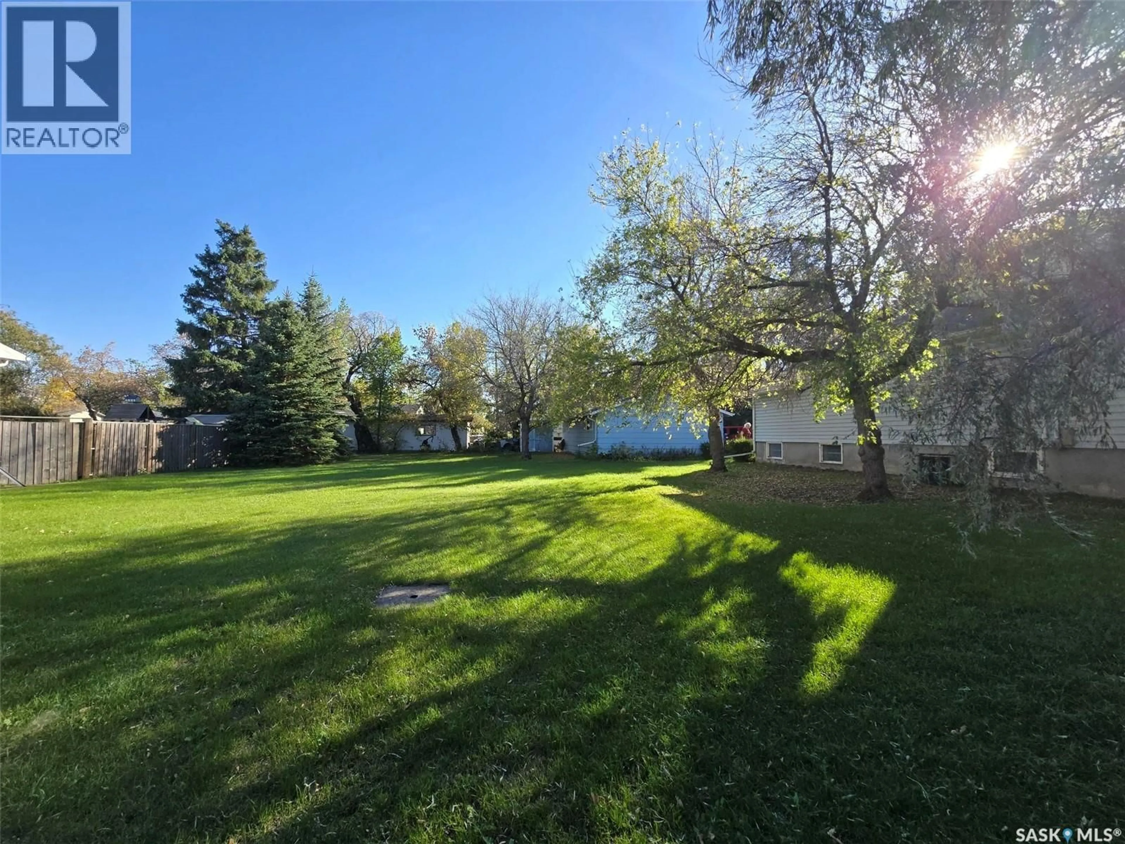 A pic from outside/outdoor area/front of a property/back of a property/a pic from drone, water/lake/river/ocean view for 501 STELLA STREET, Grenfell Saskatchewan S0G2B0