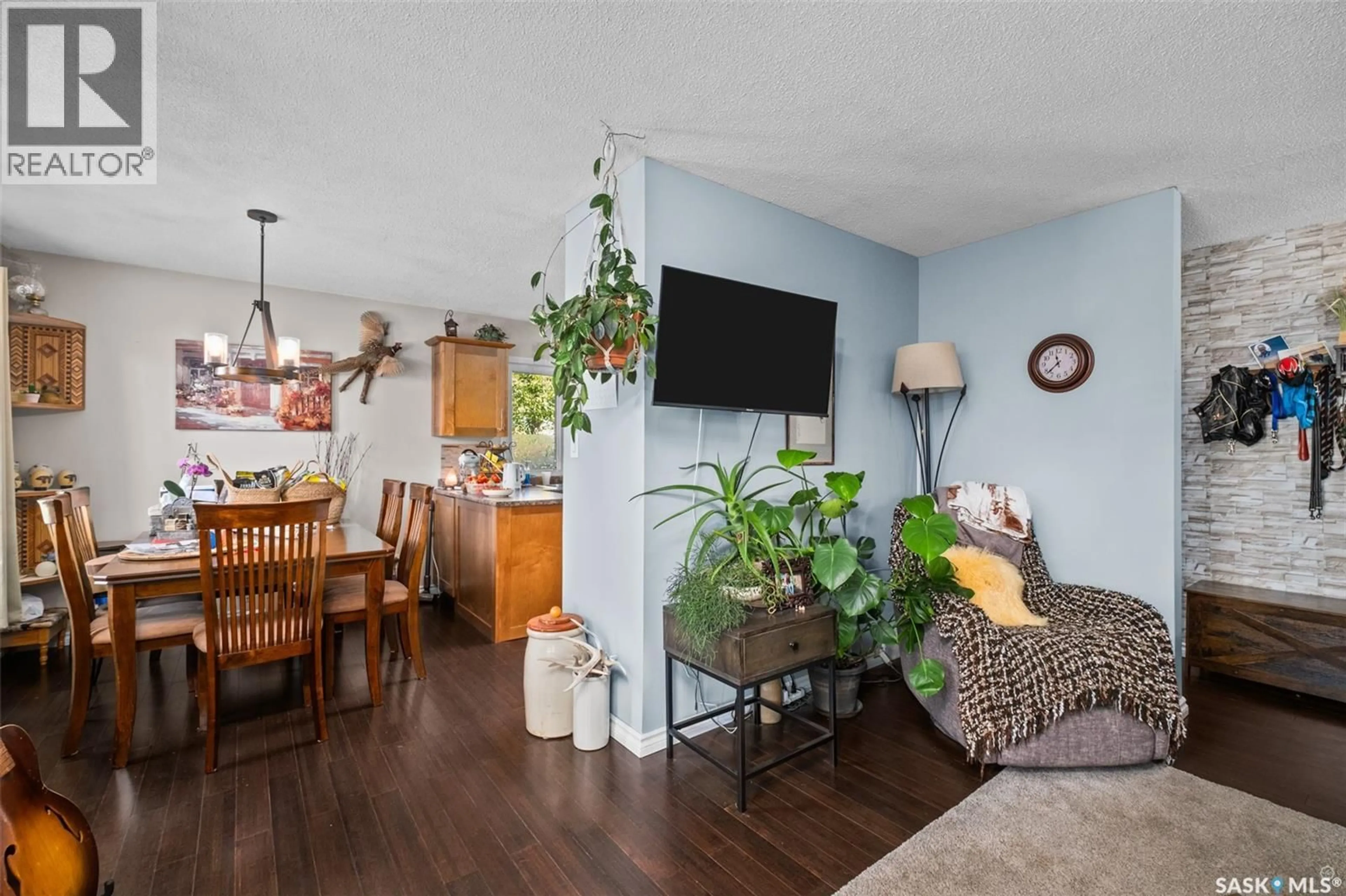 Living room with furniture, wood/laminate floor for 2702 MCDONALD AVENUE, Prince Albert Saskatchewan S6V2V9