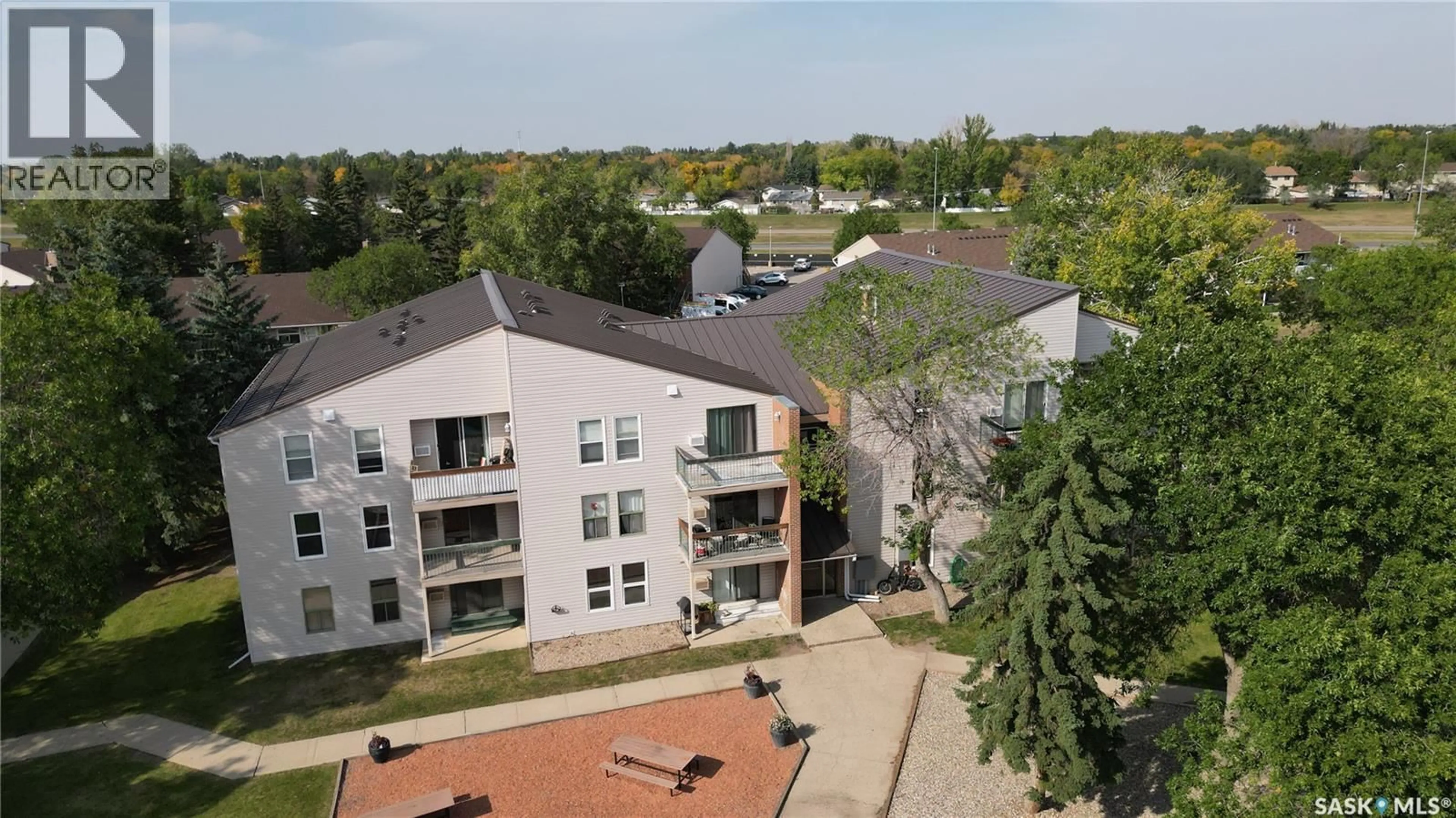A pic from outside/outdoor area/front of a property/back of a property/a pic from drone, city buildings view from balcony for 34 - 102 NOLLET AVENUE, Regina Saskatchewan S4T7P9