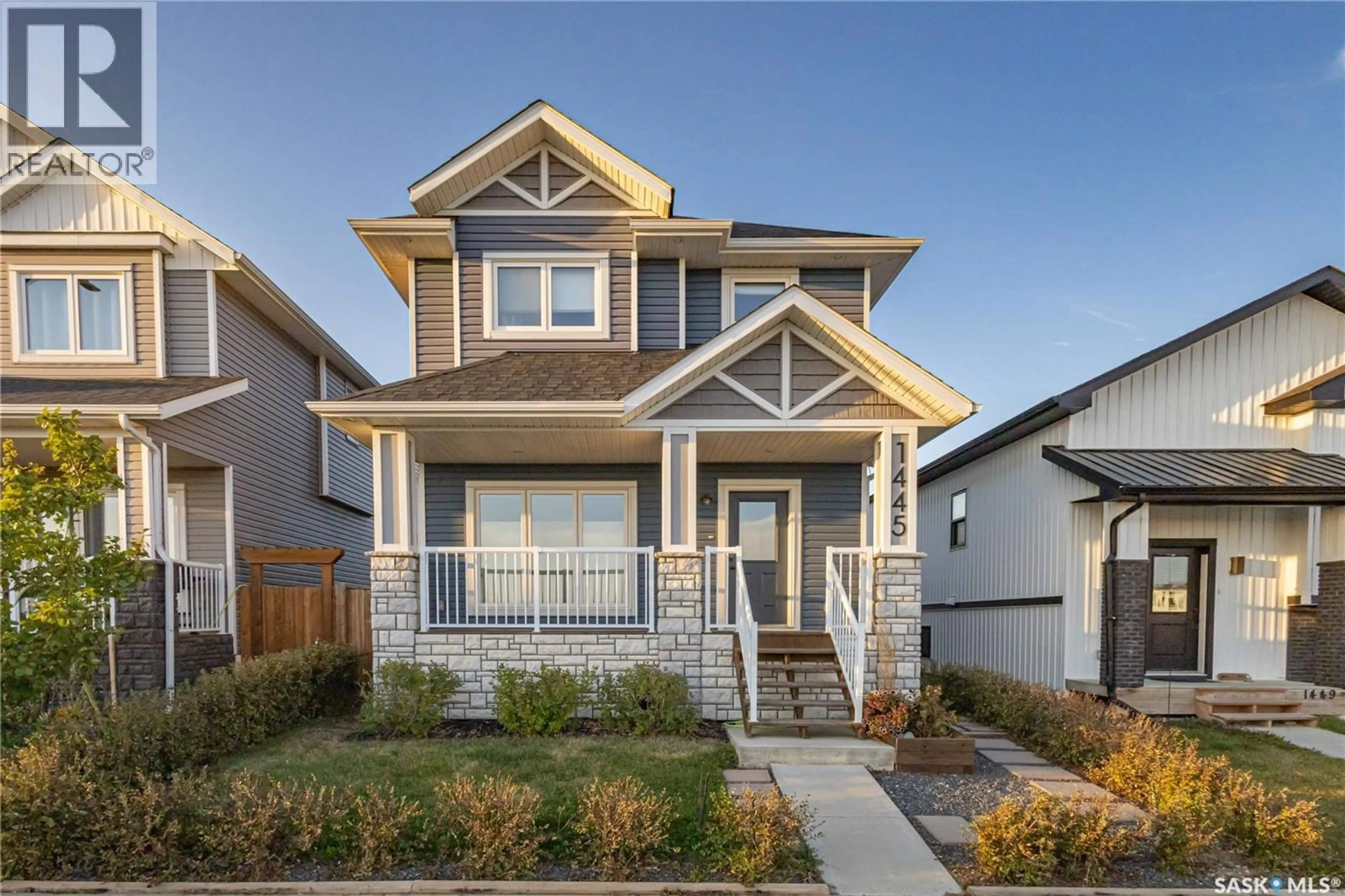 Home with vinyl exterior material, street for 1445 BESNARD DRIVE, Martensville Saskatchewan S0K2T1
