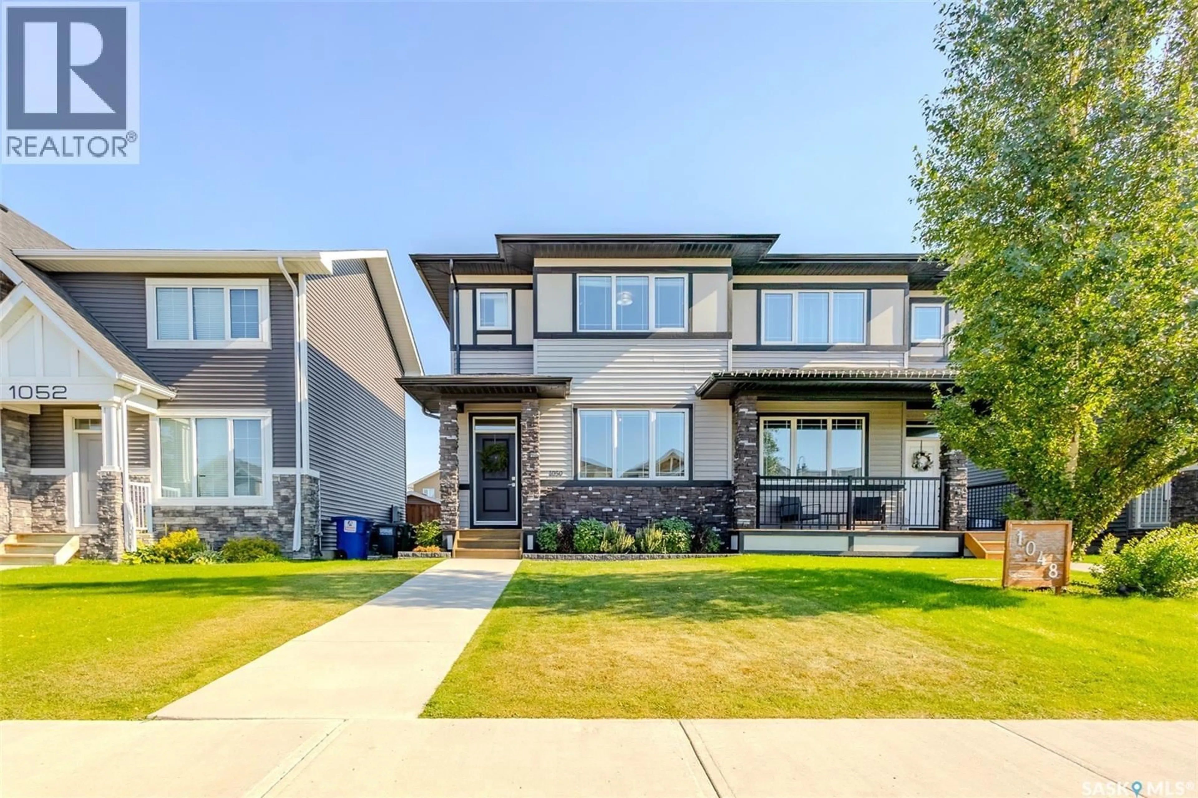 Home with vinyl exterior material, street for 1050 KOLYNCHUK CRESCENT, Saskatoon Saskatchewan S7T0X4