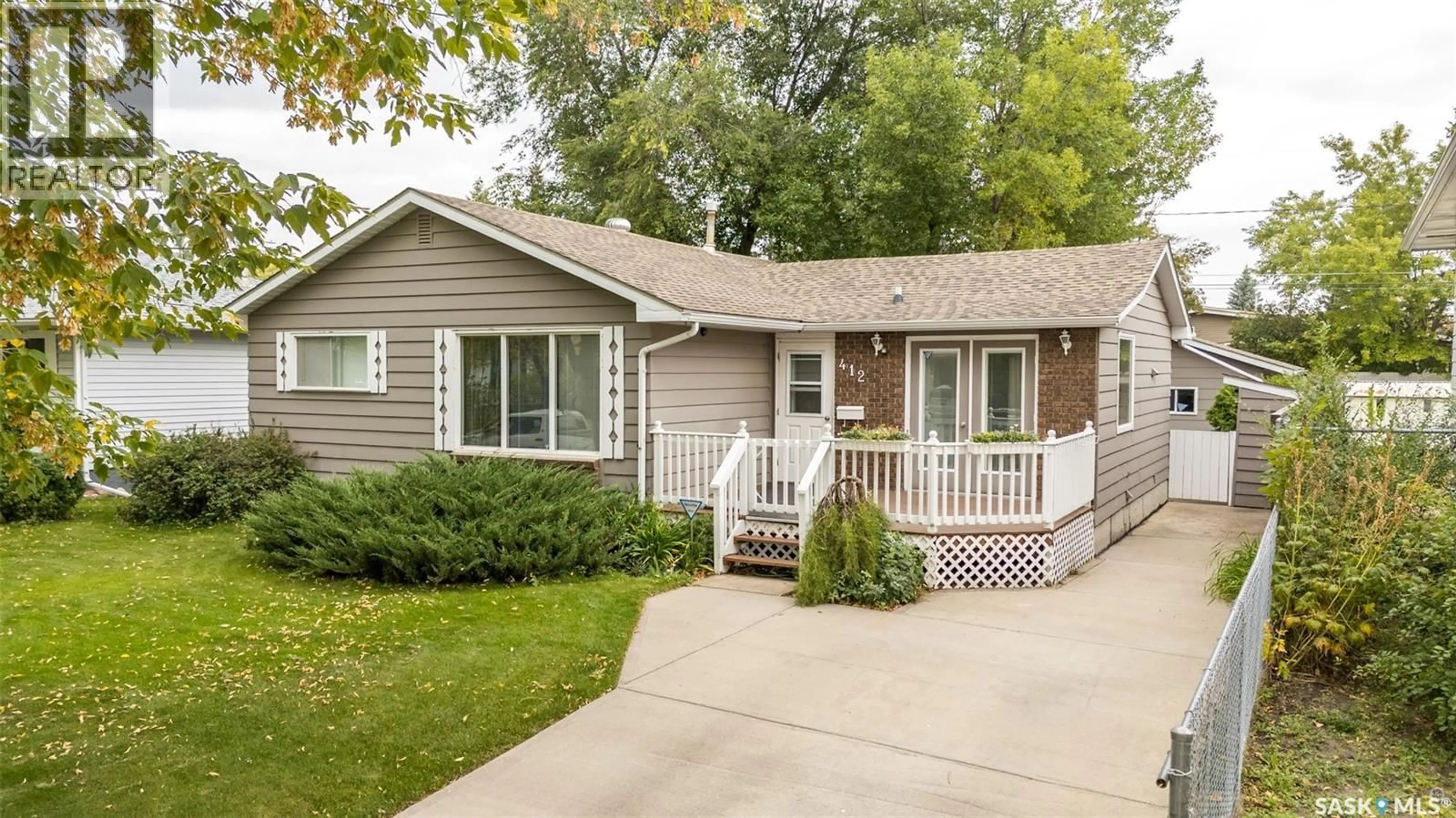 Home with vinyl exterior material, street for 412 25TH STREET, Prince Albert Saskatchewan S6V4P7