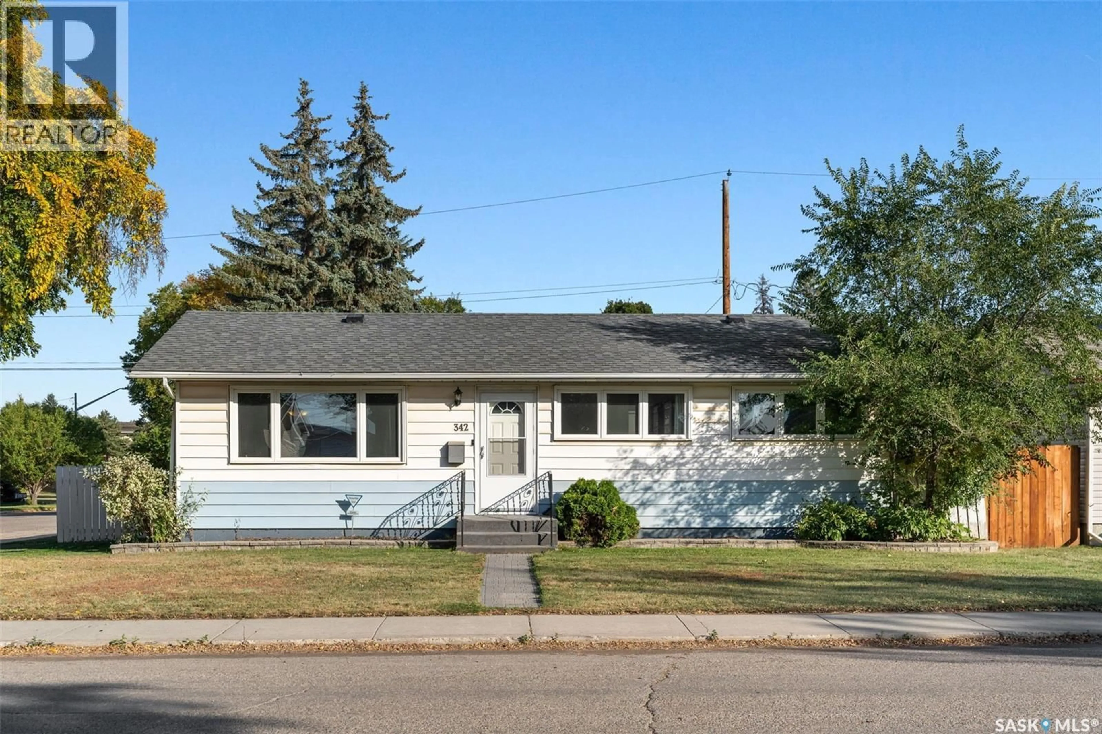 Home with vinyl exterior material, street for 342 VANCOUVER AVENUE, Saskatoon Saskatchewan S7L3P6