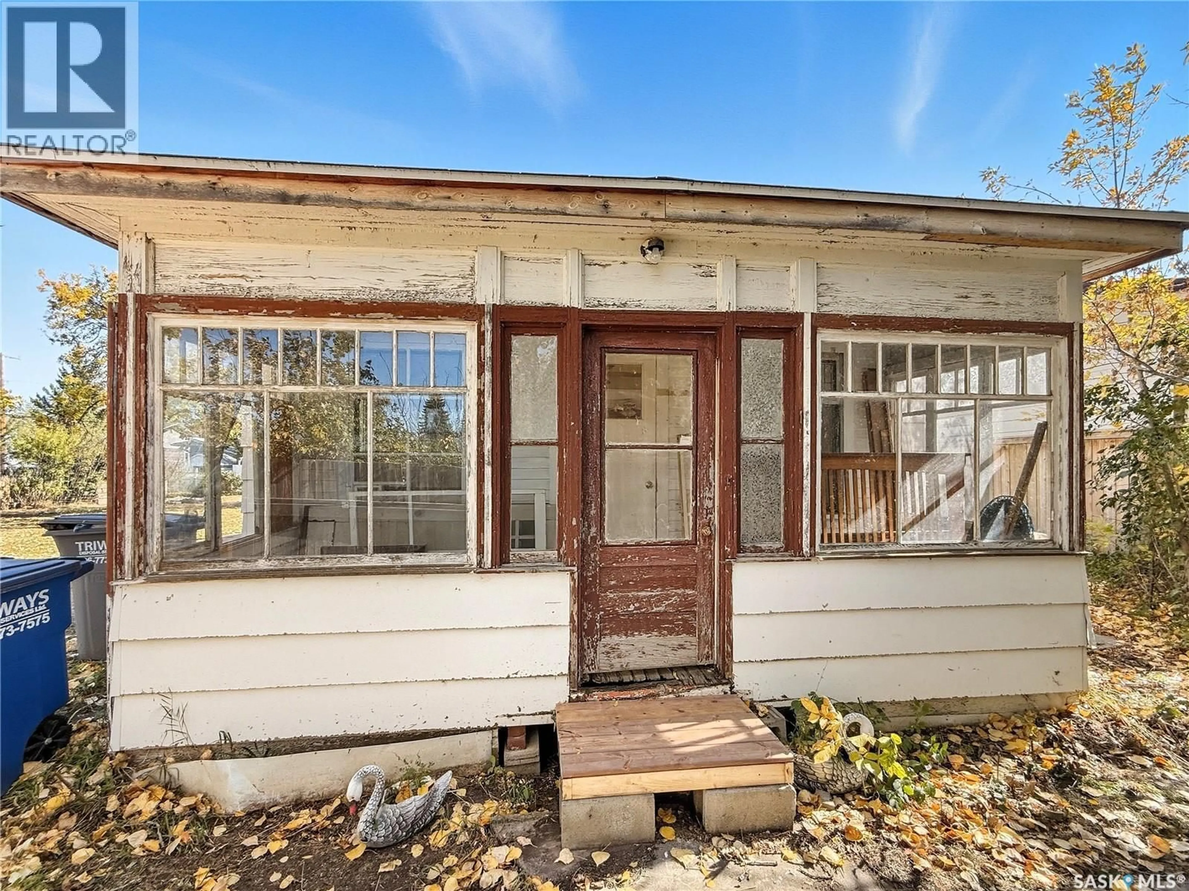 Home with vinyl exterior material, street for 319 DENNIS STREET, Herbert Saskatchewan S0H2A0