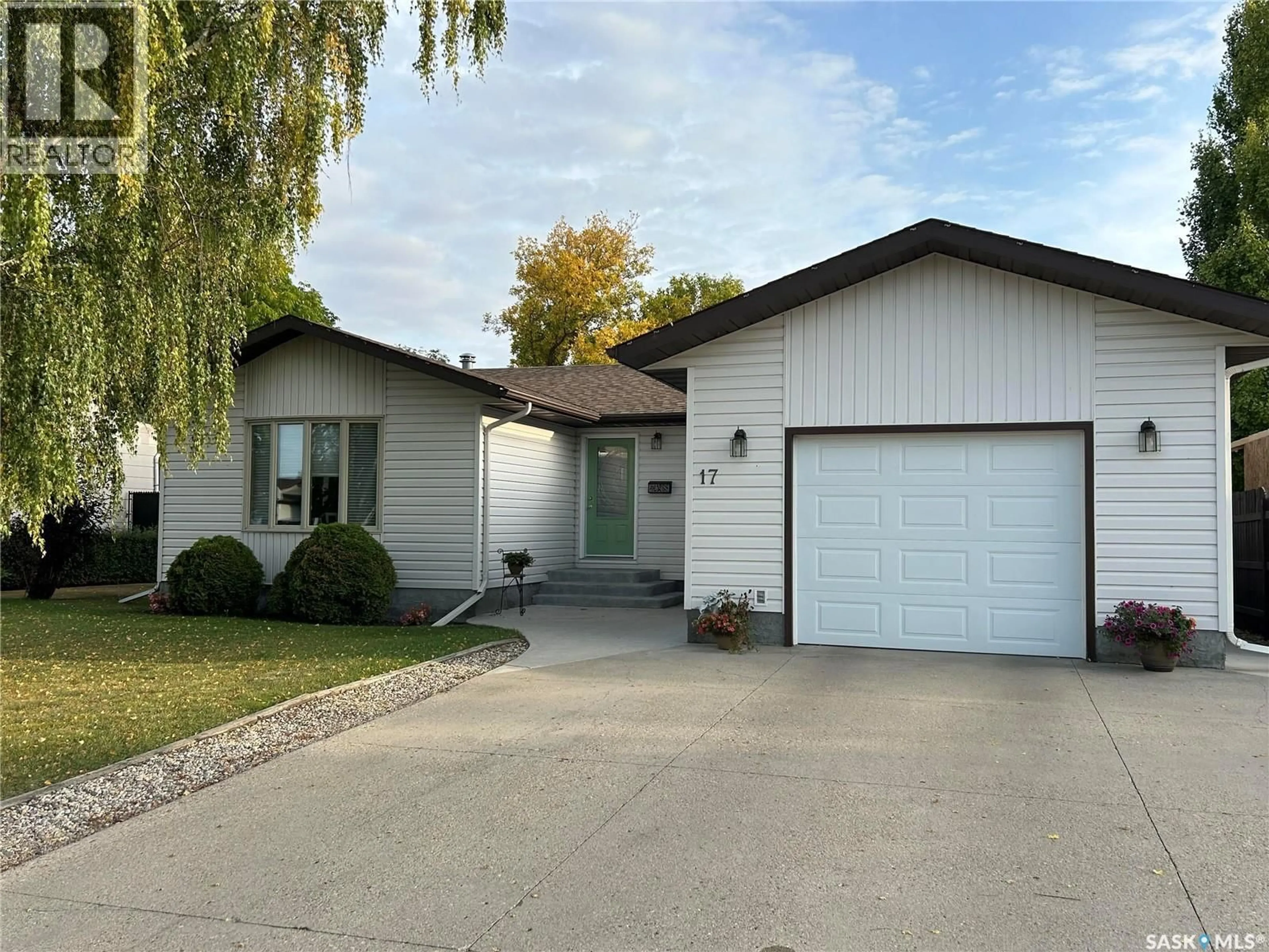 Home with vinyl exterior material, street for 17 STEBBINGS CRESCENT, Humboldt Saskatchewan S0K2A0