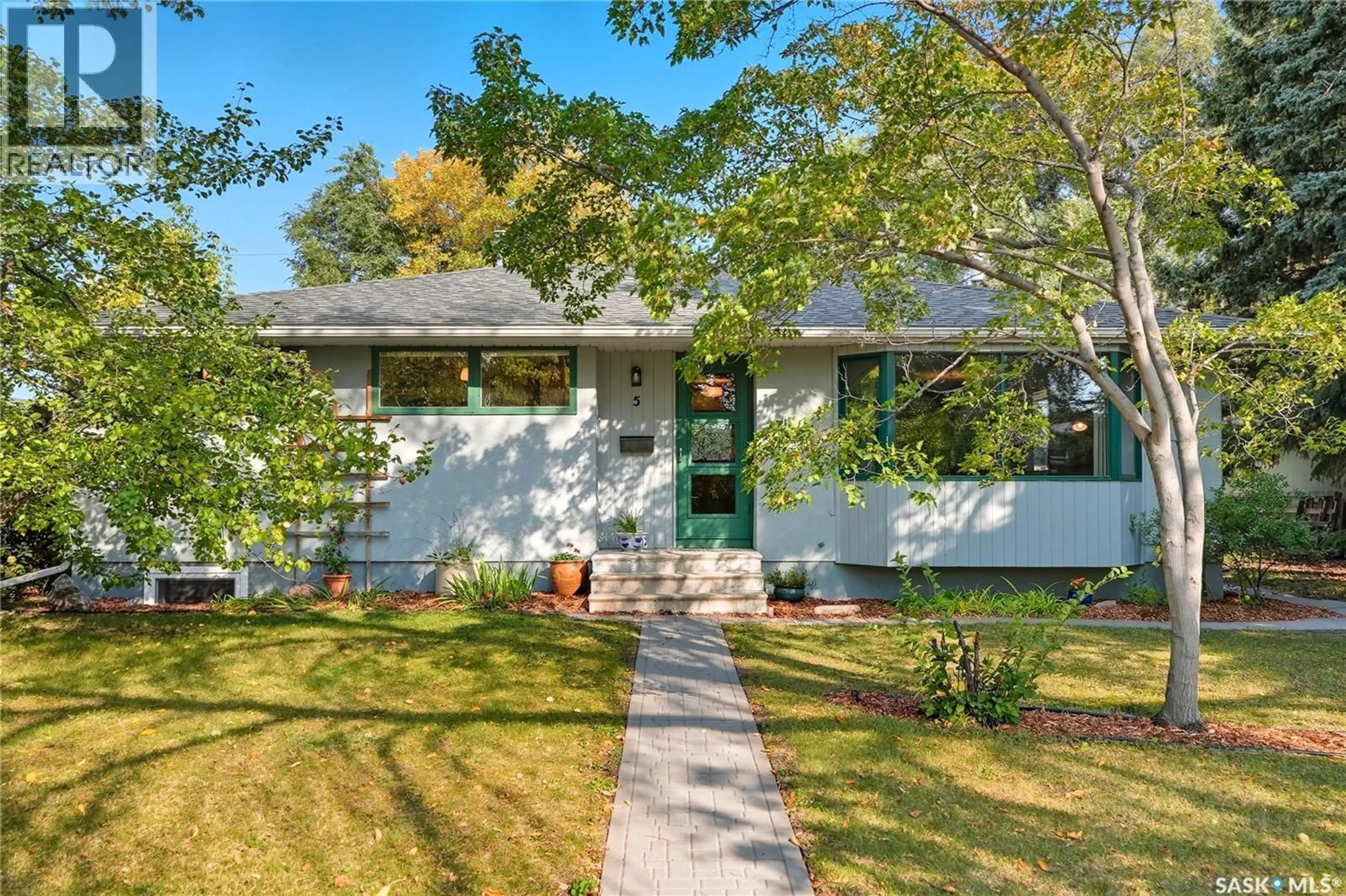 Home with vinyl exterior material, street for 5 LING STREET, Saskatoon Saskatchewan S7H3G2