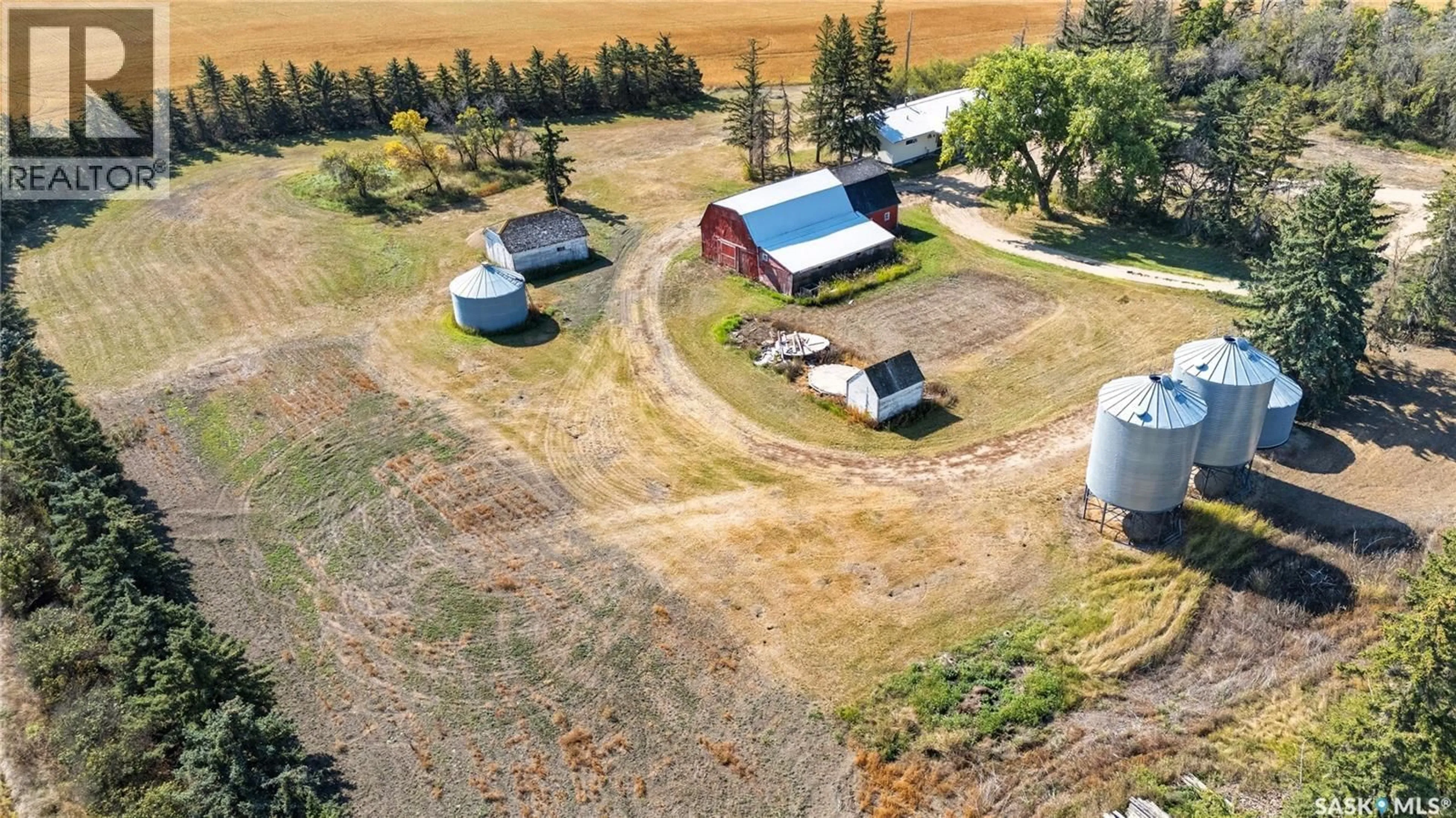A pic from outside/outdoor area/front of a property/back of a property/a pic from drone, building for POMRENKE ACREAGE, Lake Of The Rivers Rm No. 72 Saskatchewan S0H0B0