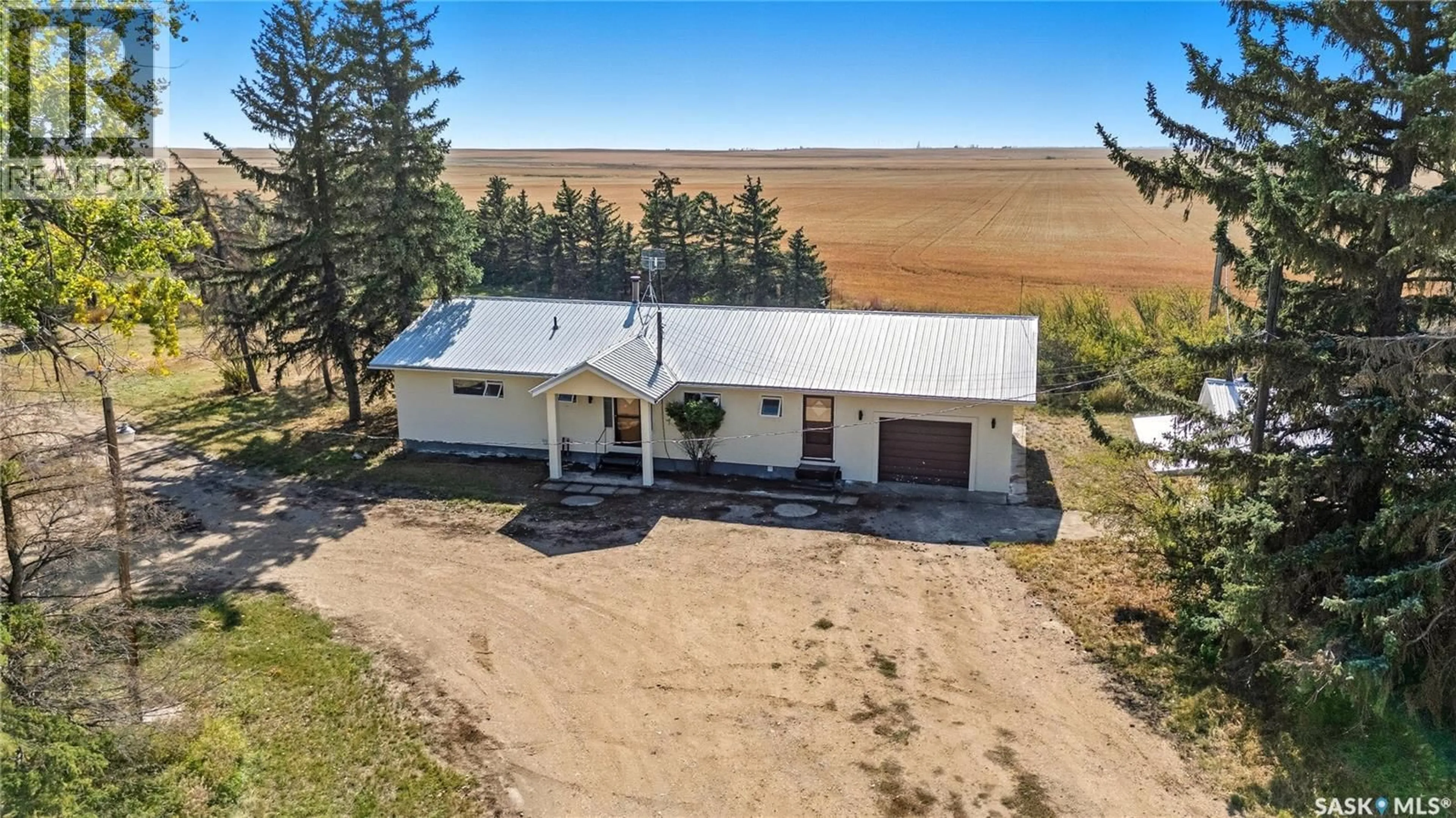 A pic from outside/outdoor area/front of a property/back of a property/a pic from drone, building for POMRENKE ACREAGE, Lake Of The Rivers Rm No. 72 Saskatchewan S0H0B0