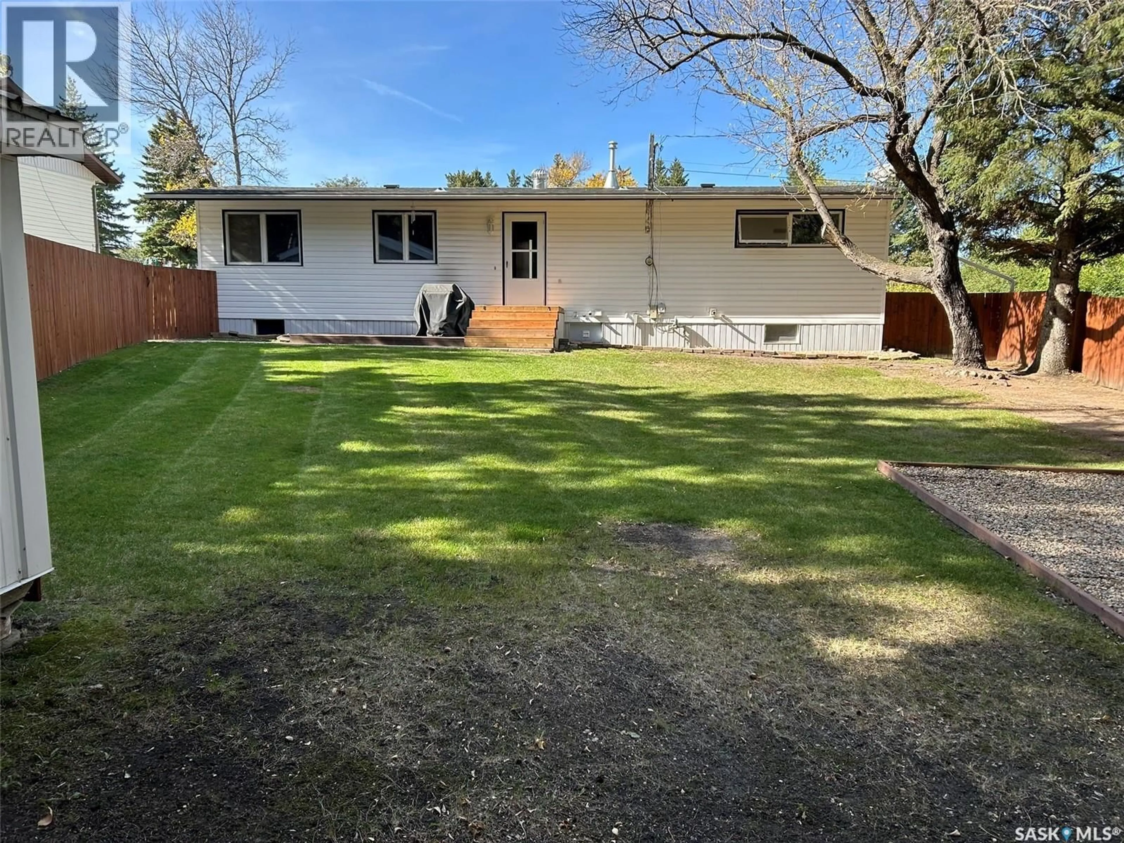 A pic from outside/outdoor area/front of a property/back of a property/a pic from drone, street for 602 HALL STREET, Kelvington Saskatchewan S0A1W0