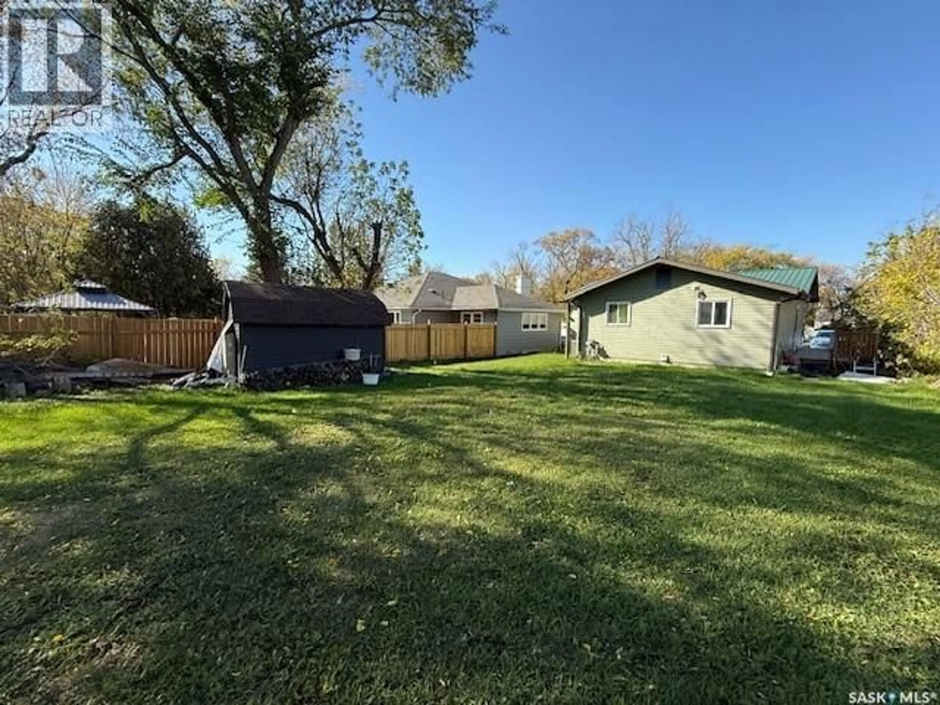 A pic from outside/outdoor area/front of a property/back of a property/a pic from drone, unknown for 608 EAST AVENUE, Kamsack Saskatchewan S0A1S0