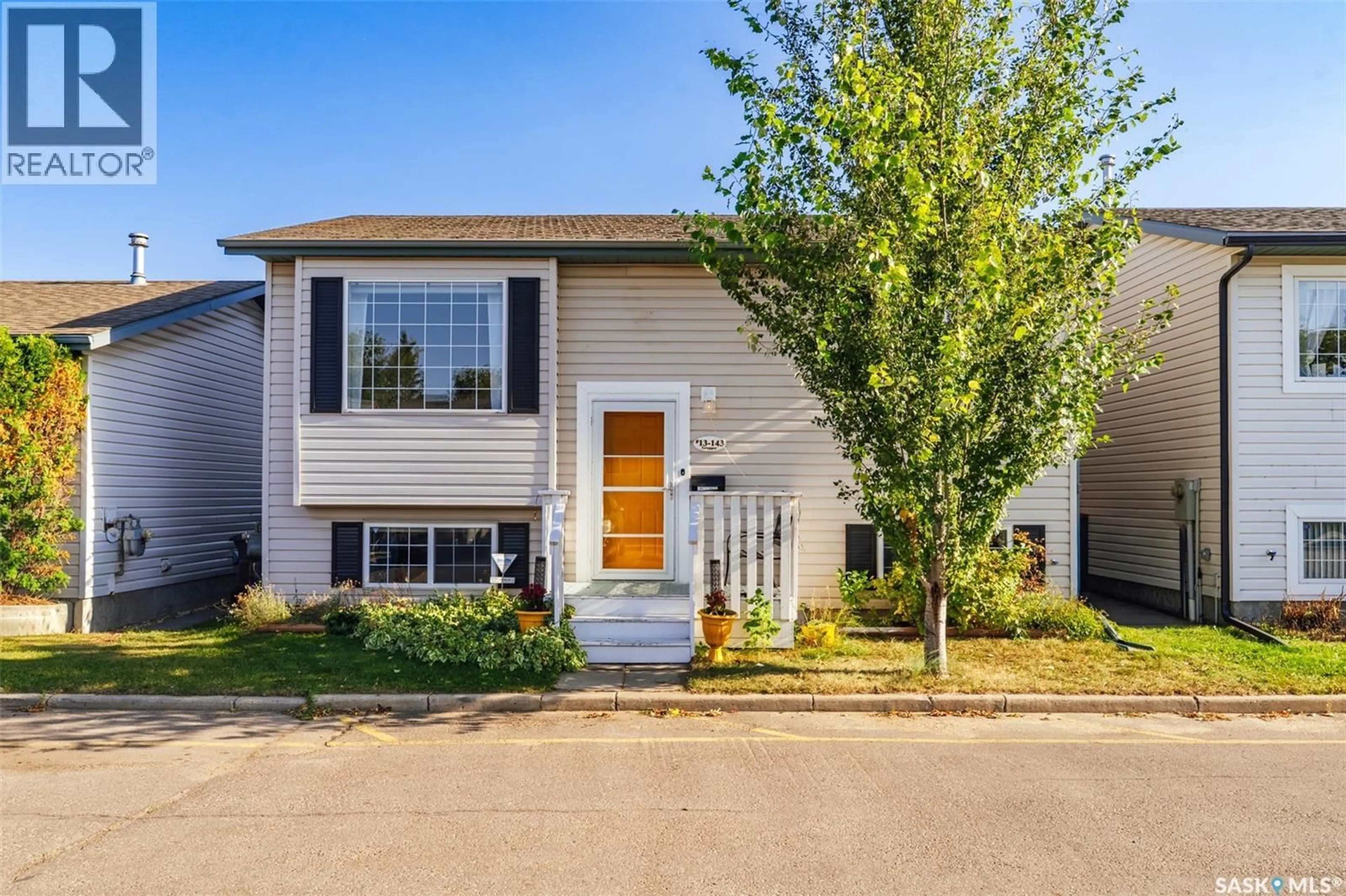 Home with vinyl exterior material, street for 13 143 GROPPER CRESCENT, Saskatoon Saskatchewan S7M5W2