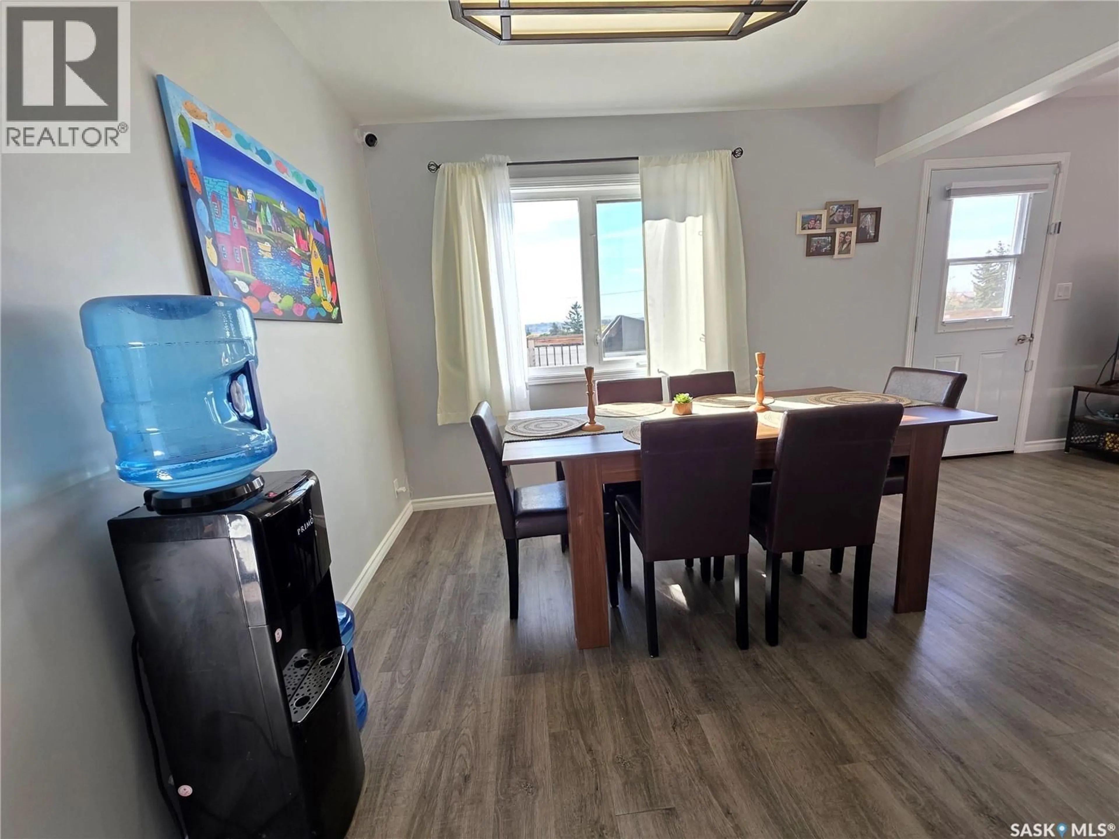 Dining room, wood/laminate floor for 601 4TH AVENUE, Swift Current Saskatchewan S9H0V7