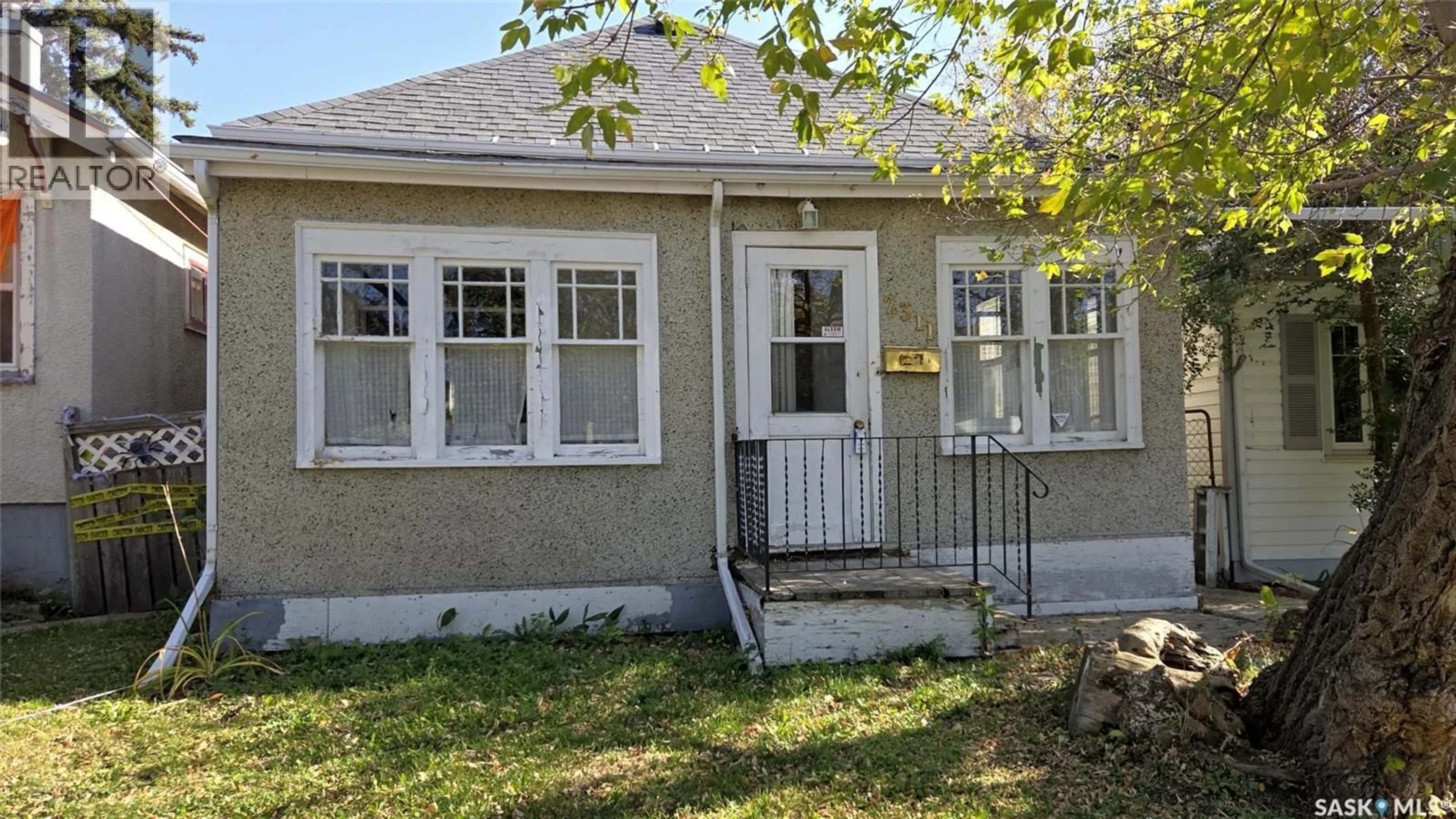 Home with vinyl exterior material, street for 2311 REYNOLDS STREET, Regina Saskatchewan S4N3N6