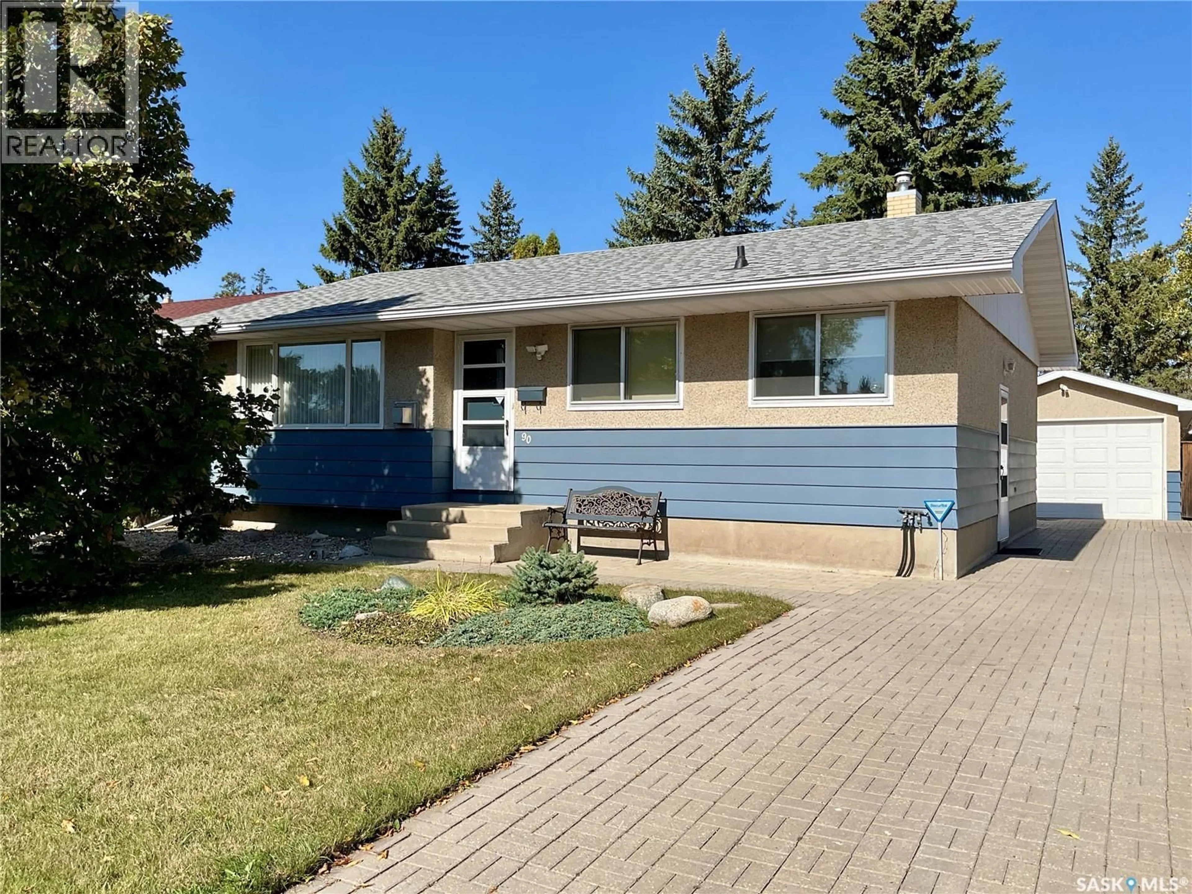 Home with vinyl exterior material, street for 90 HAMMOND ROAD, Regina Saskatchewan S4R3C6