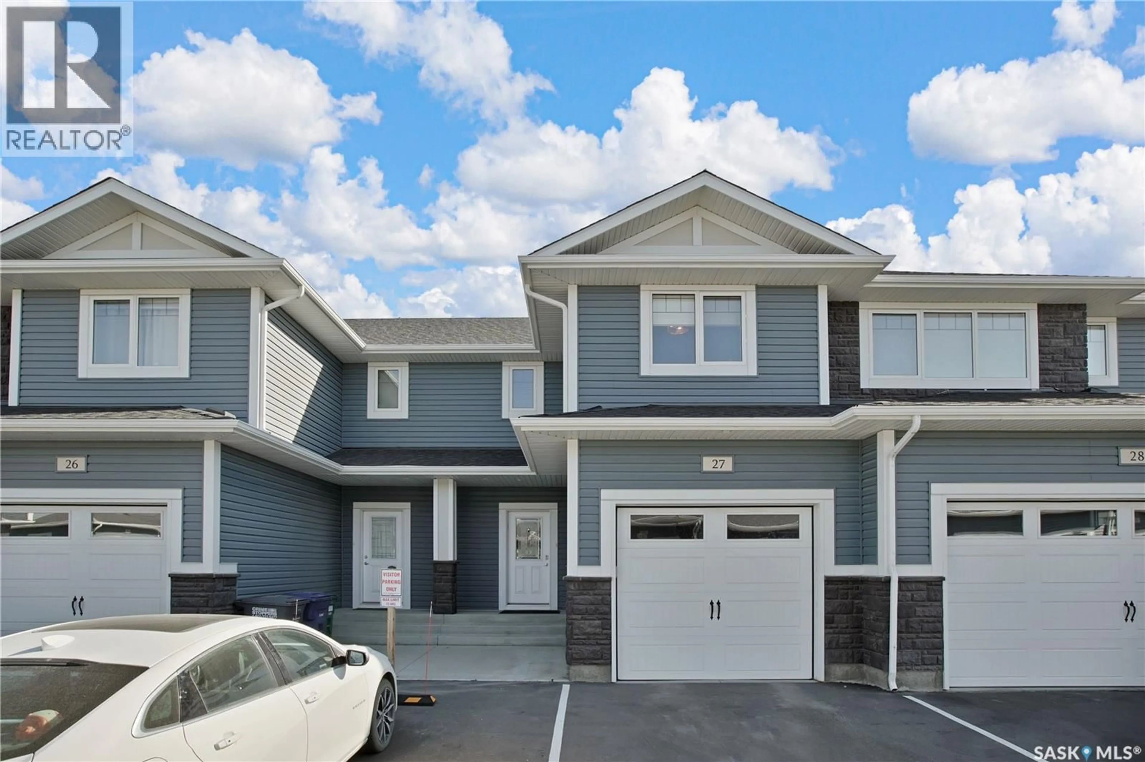 Home with vinyl exterior material, street for 27 115 VELTKAMP CRESCENT, Saskatoon Saskatchewan S7T0T7