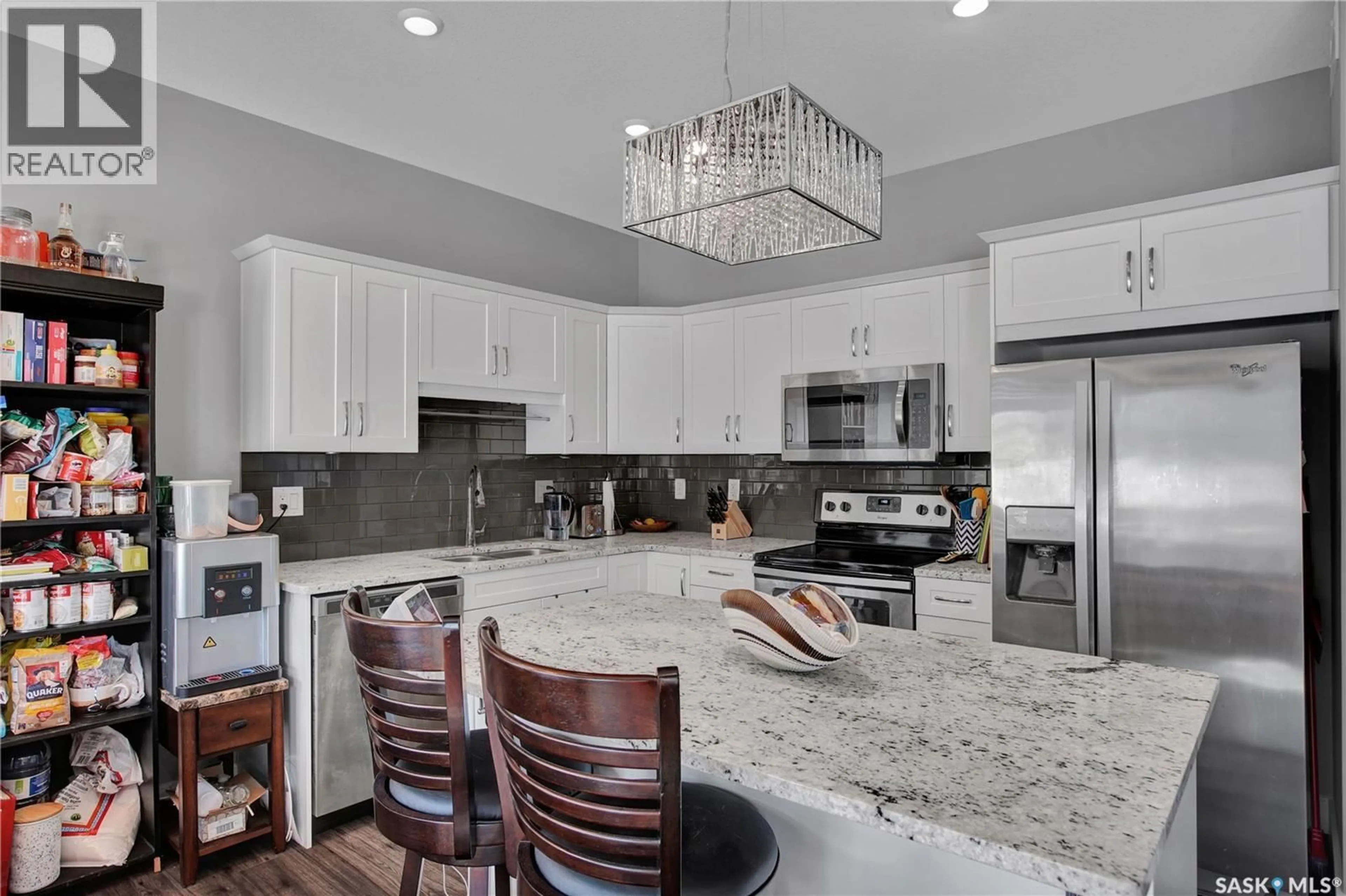 Open concept kitchen, ceramic/tile floor for 27 115 VELTKAMP CRESCENT, Saskatoon Saskatchewan S7T0T7
