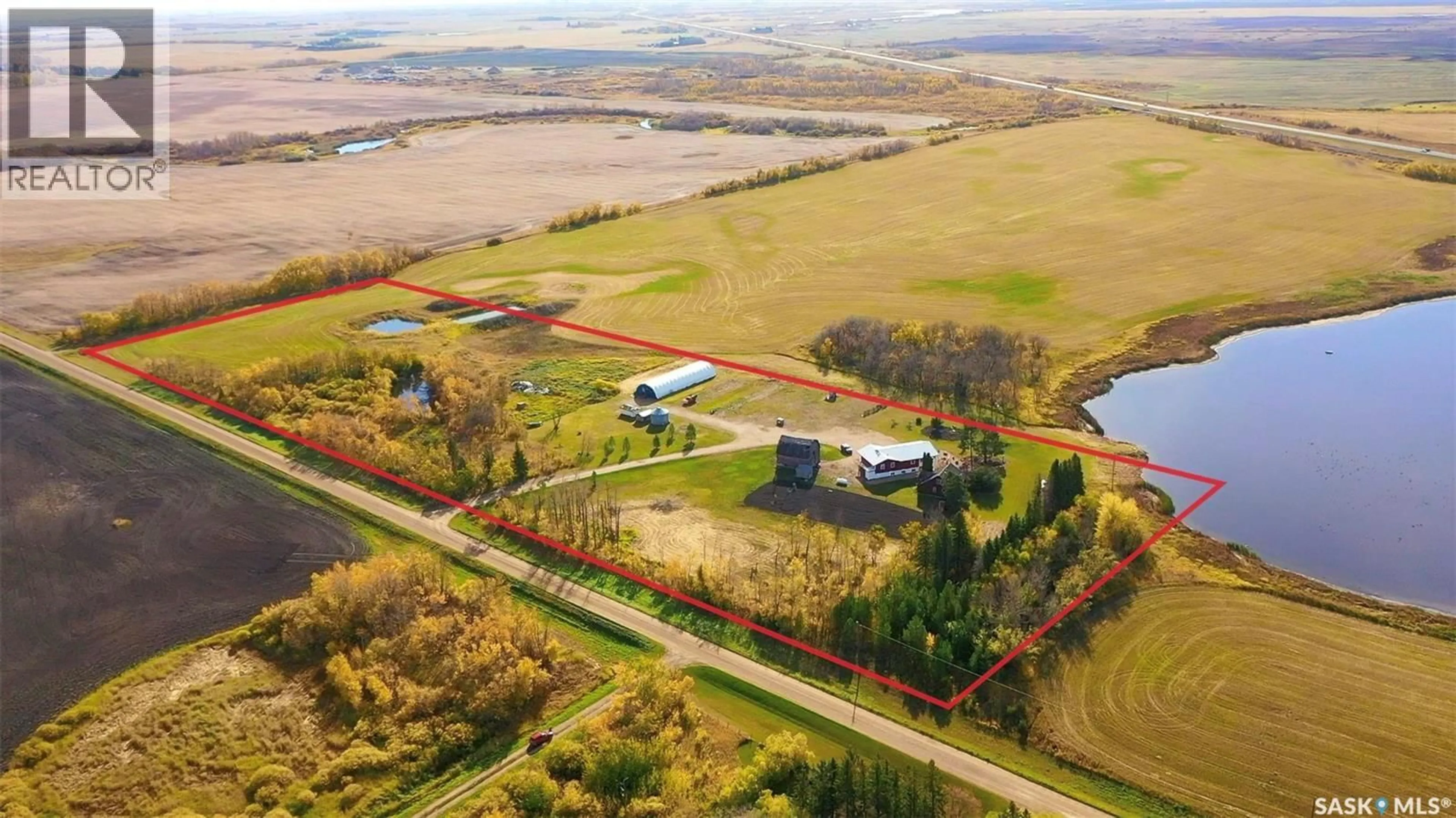 A pic from outside/outdoor area/front of a property/back of a property/a pic from drone, water/lake/river/ocean view for SH ACREAGE, Orkney Rm No. 244 Saskatchewan S0A3V0