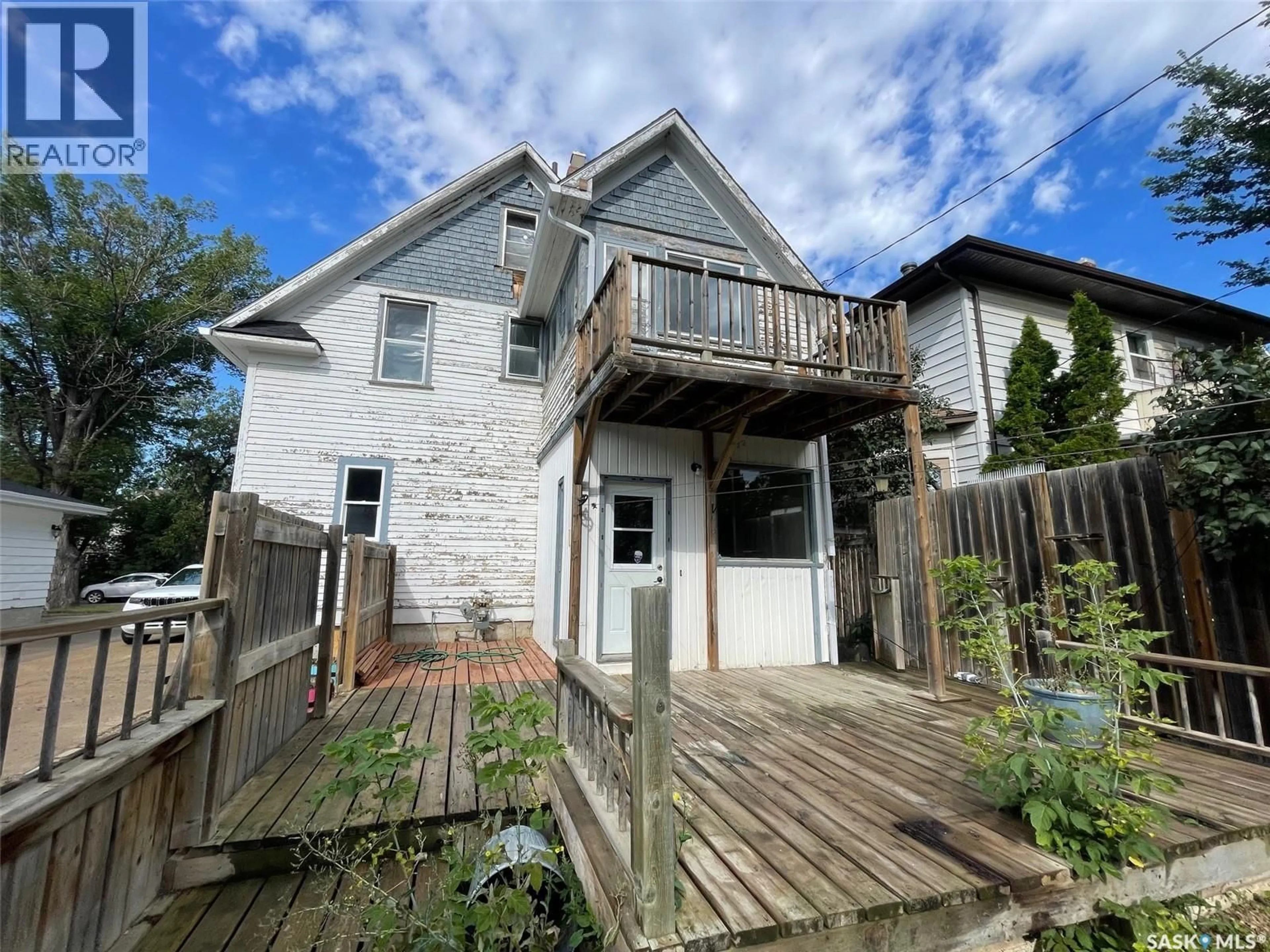 A pic from outside/outdoor area/front of a property/back of a property/a pic from drone, building for 1139 1ST AVENUE, Moose Jaw Saskatchewan S6H3N4