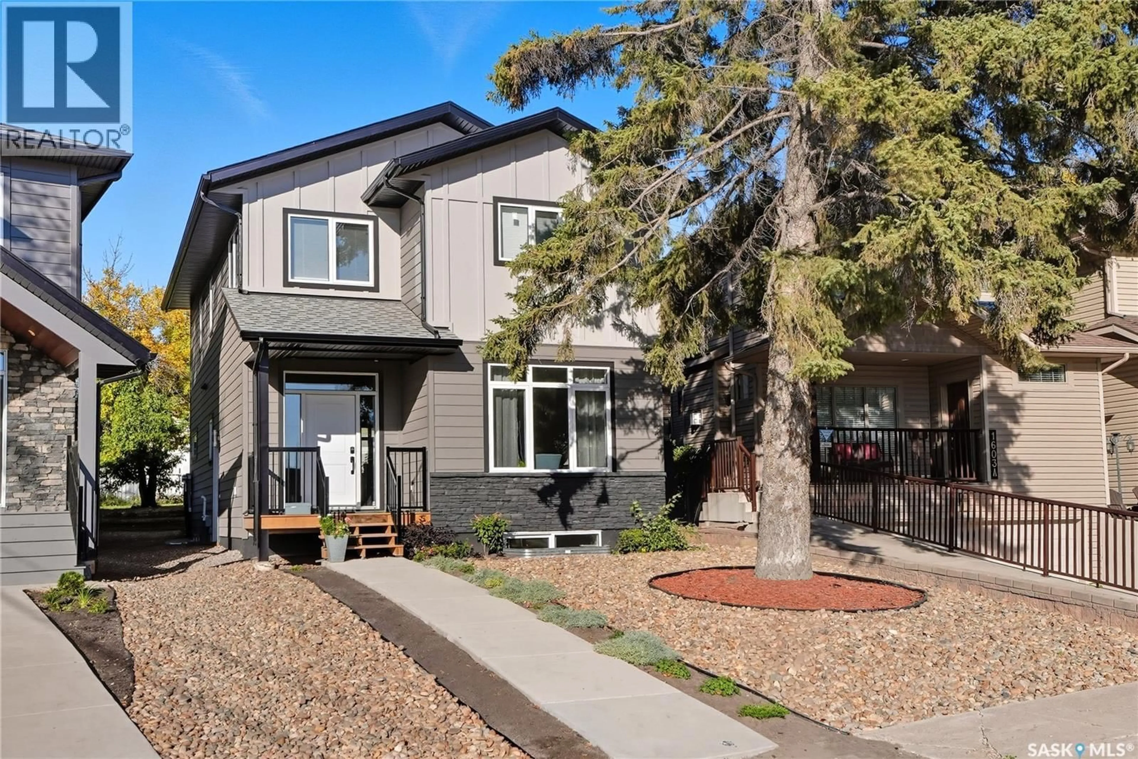 Home with brick exterior material, street for 1601b 9TH AVENUE, Saskatoon Saskatchewan S7K2Z9