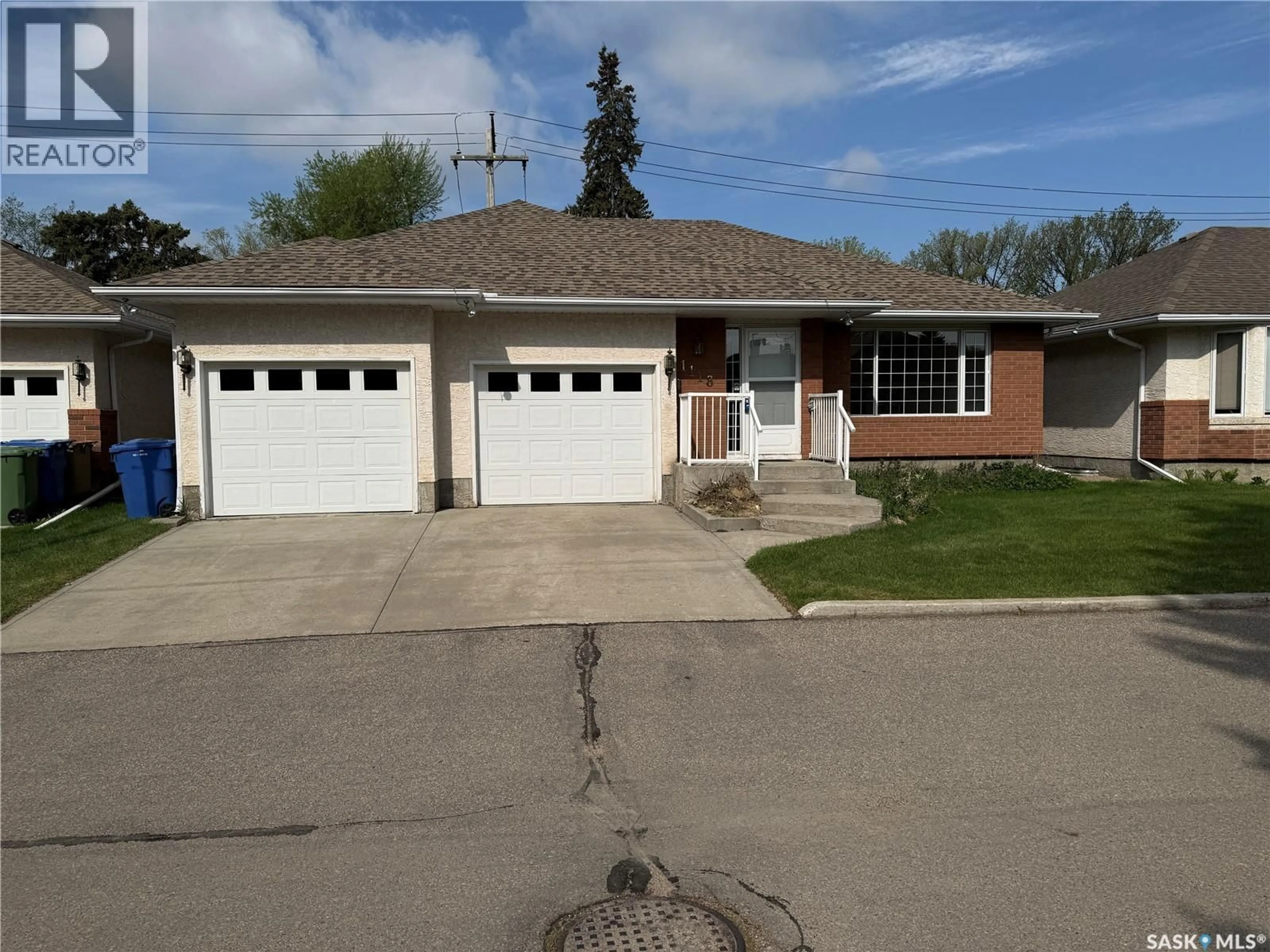 Home with brick exterior material, street for 1118 SELO PLACE, Regina Saskatchewan S4S3W9