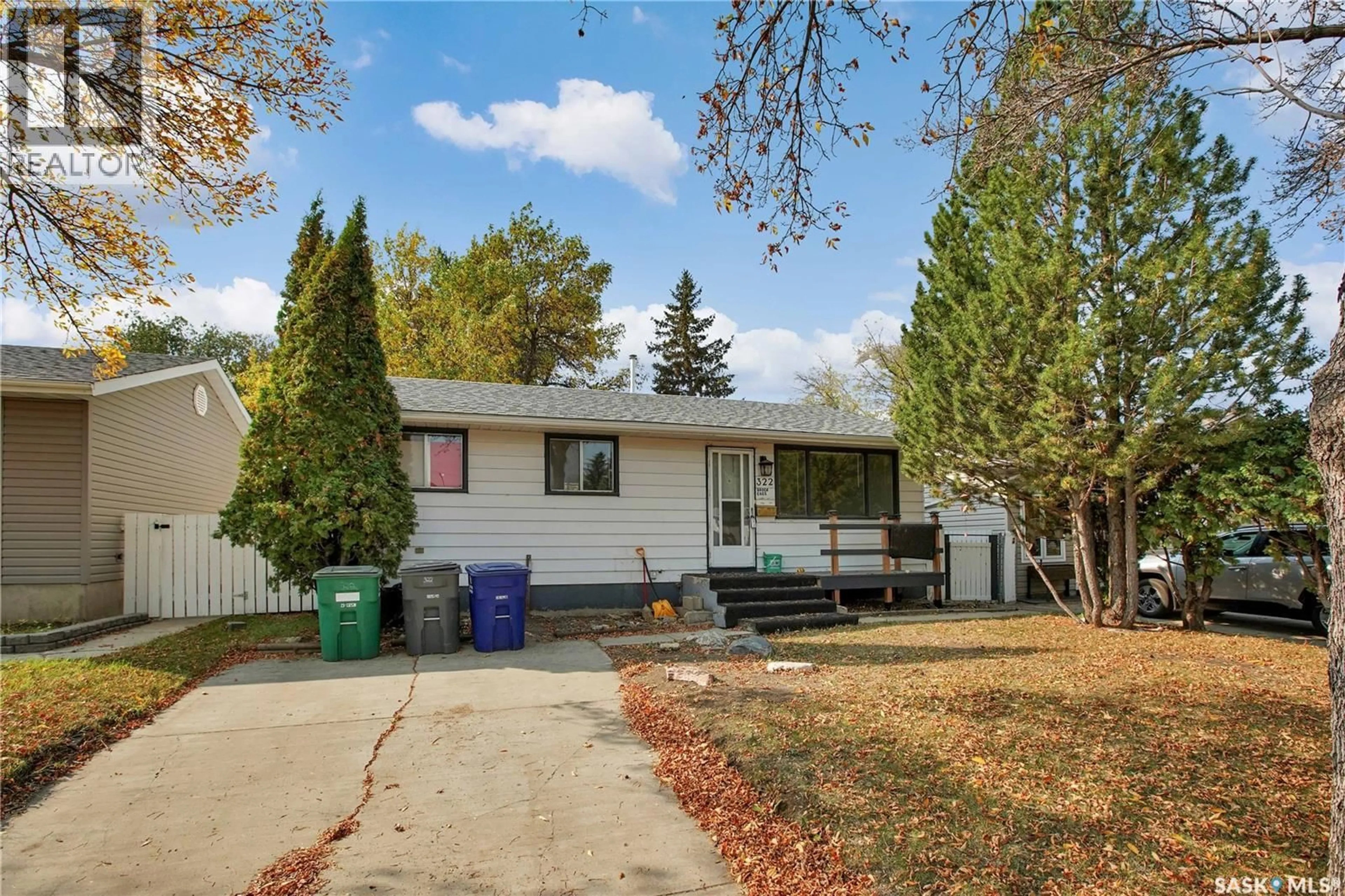 Home with vinyl exterior material, street for 322 BROCK CRESCENT, Saskatoon Saskatchewan S7H4N5