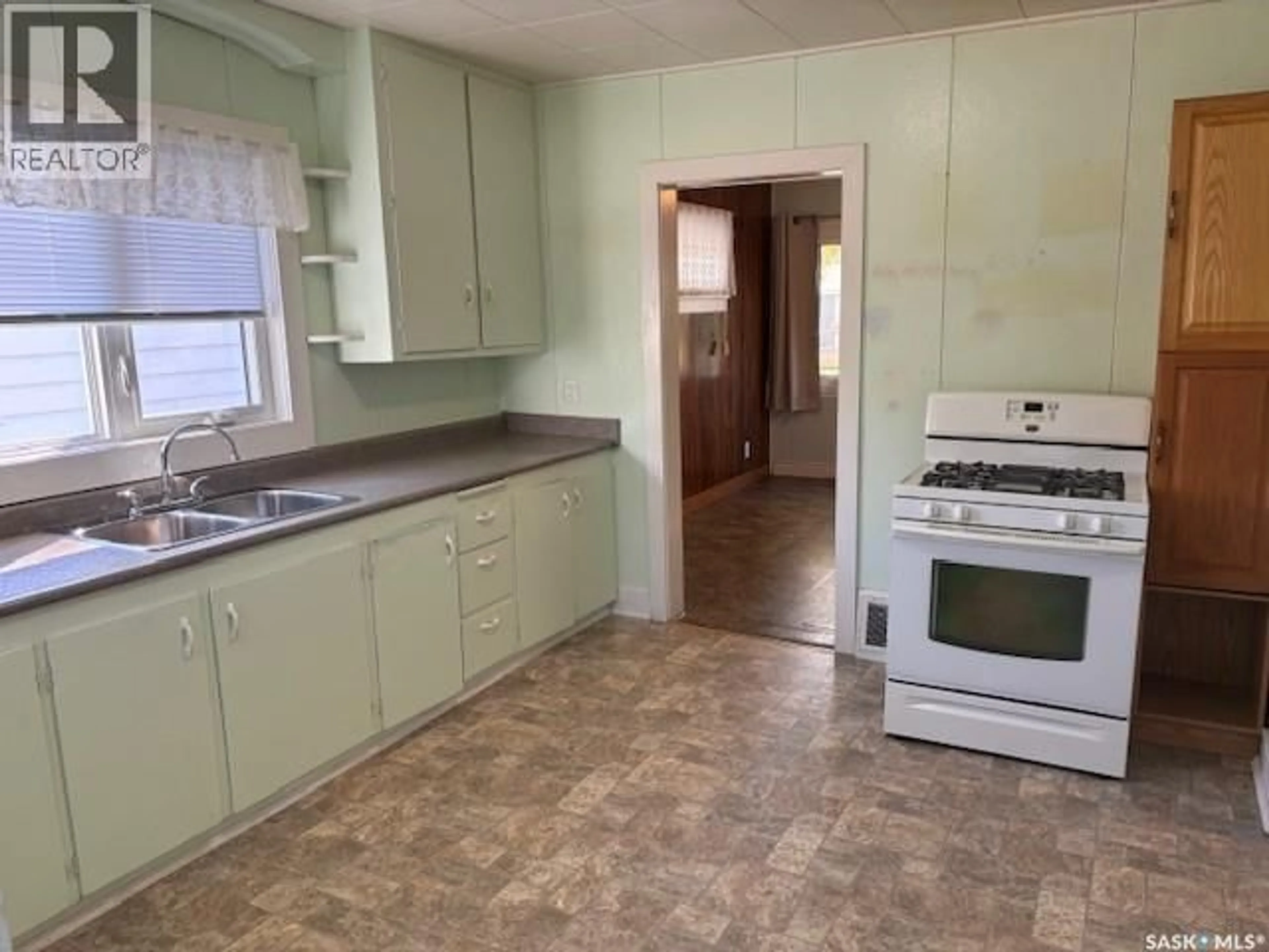 Standard kitchen, ceramic/tile floor for 239 3RD AVENUE, Canora Saskatchewan S0A0L0