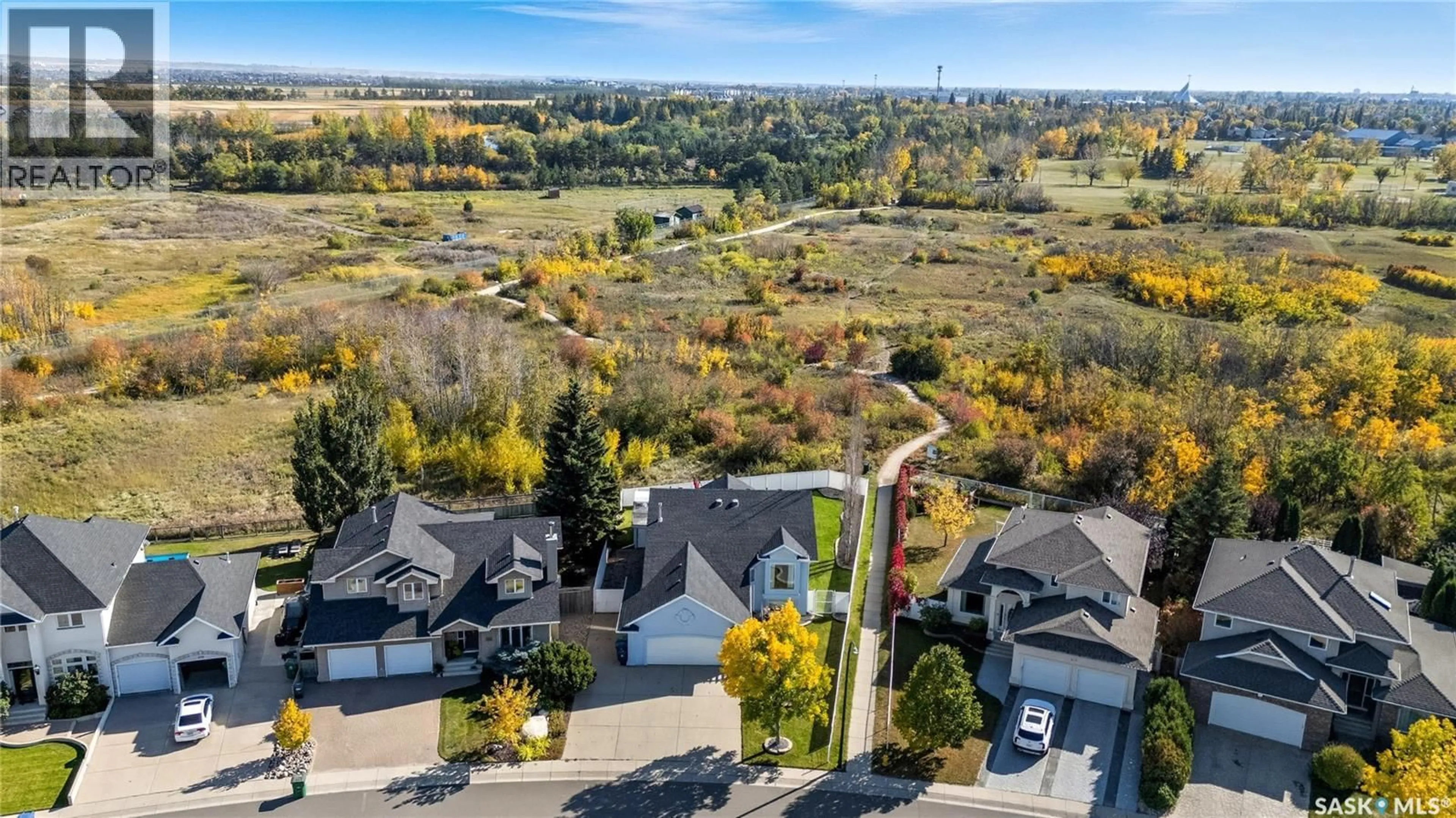 A pic from outside/outdoor area/front of a property/back of a property/a pic from drone, unknown for 422 LE MAY CRESCENT, Saskatoon Saskatchewan S7S1L1