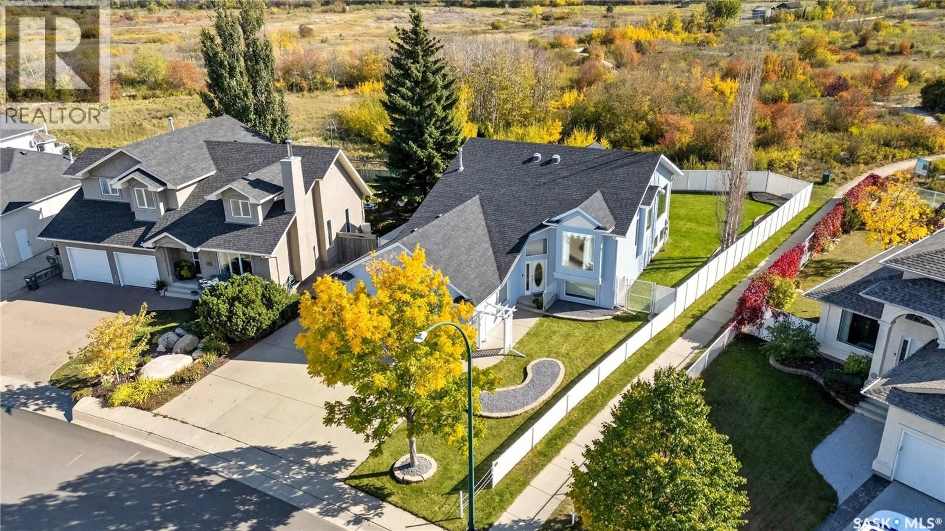 A pic from outside/outdoor area/front of a property/back of a property/a pic from drone, street for 422 LE MAY CRESCENT, Saskatoon Saskatchewan S7S1L1