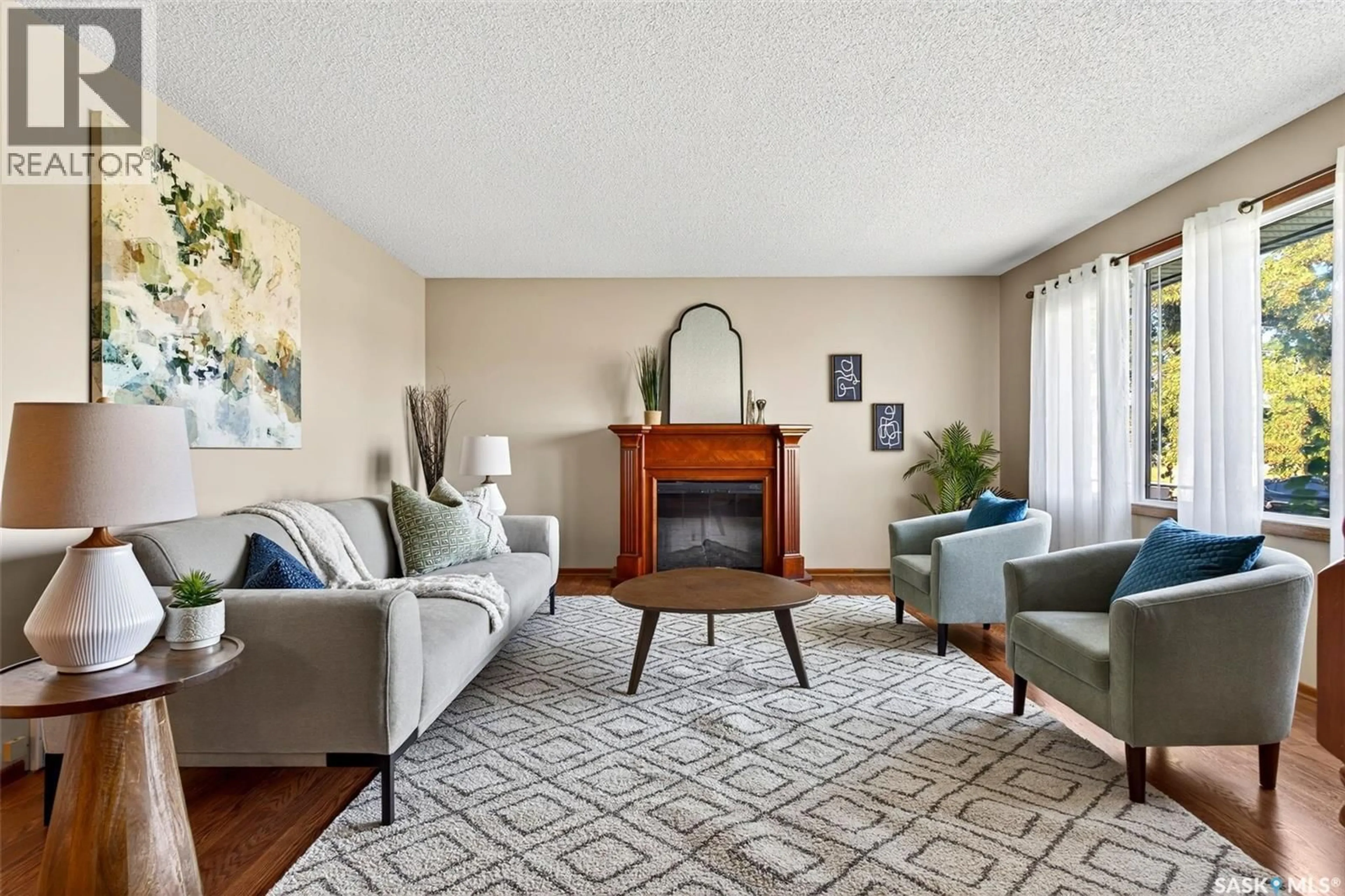 Living room with furniture, carpet floor for 62 LYONS STREET, Regina Saskatchewan S4T6G2