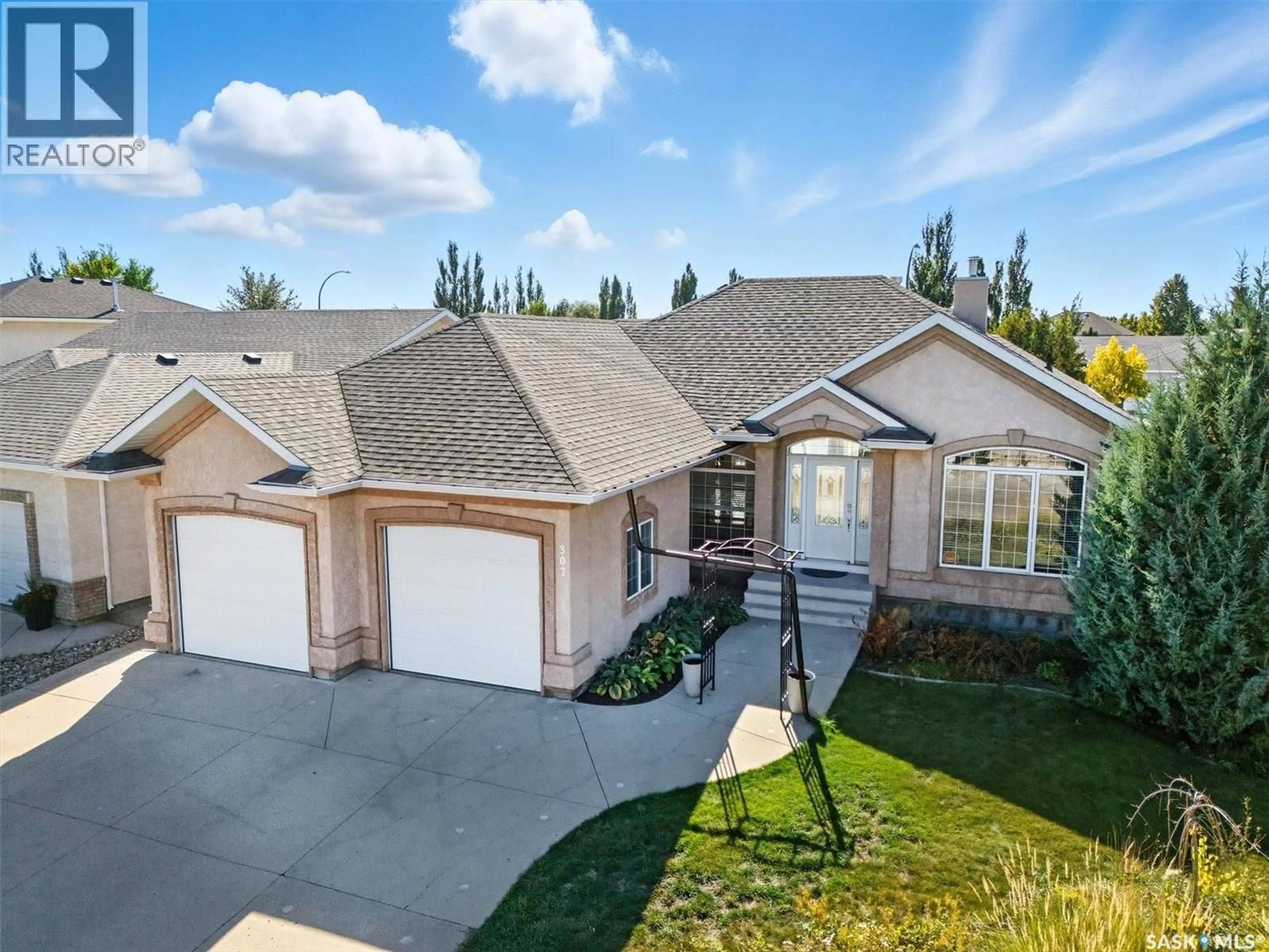 Home with brick exterior material, street for 307 BEECHMONT LANE, Saskatoon Saskatchewan S7V1C6