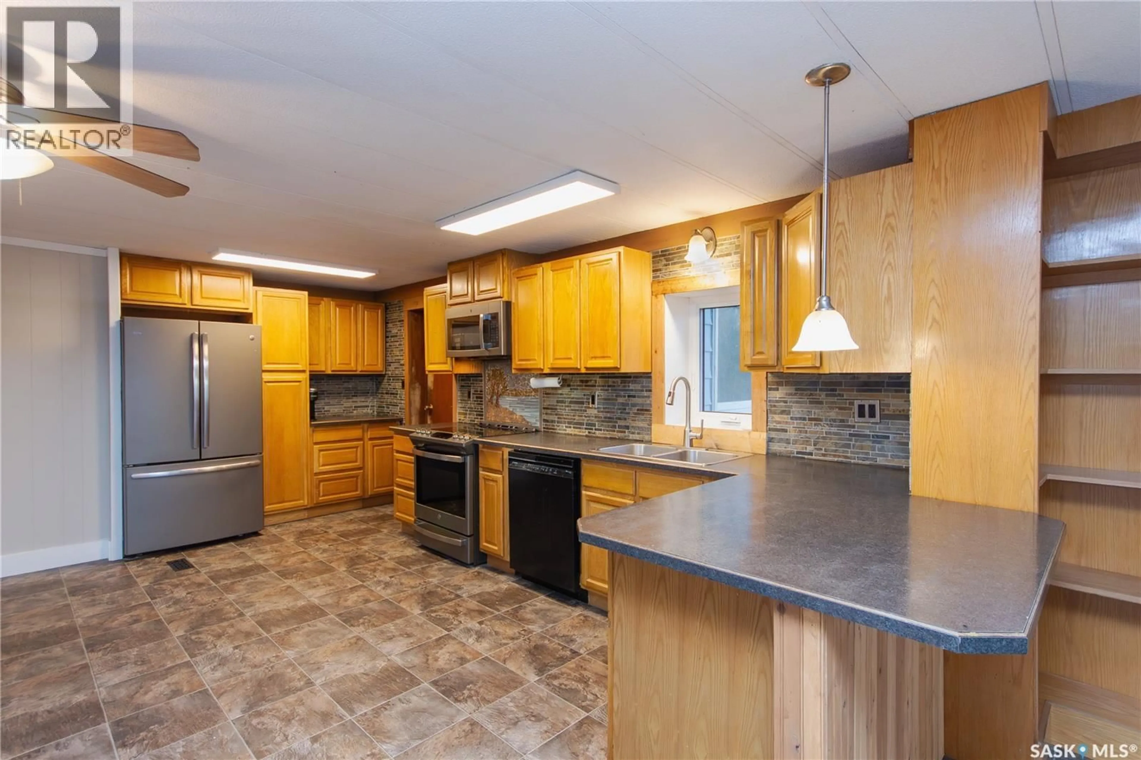 Open concept kitchen, ceramic/tile floor for DOUGLAS ACREAGE, Douglas Rm No. 436 Saskatchewan S0M2V0